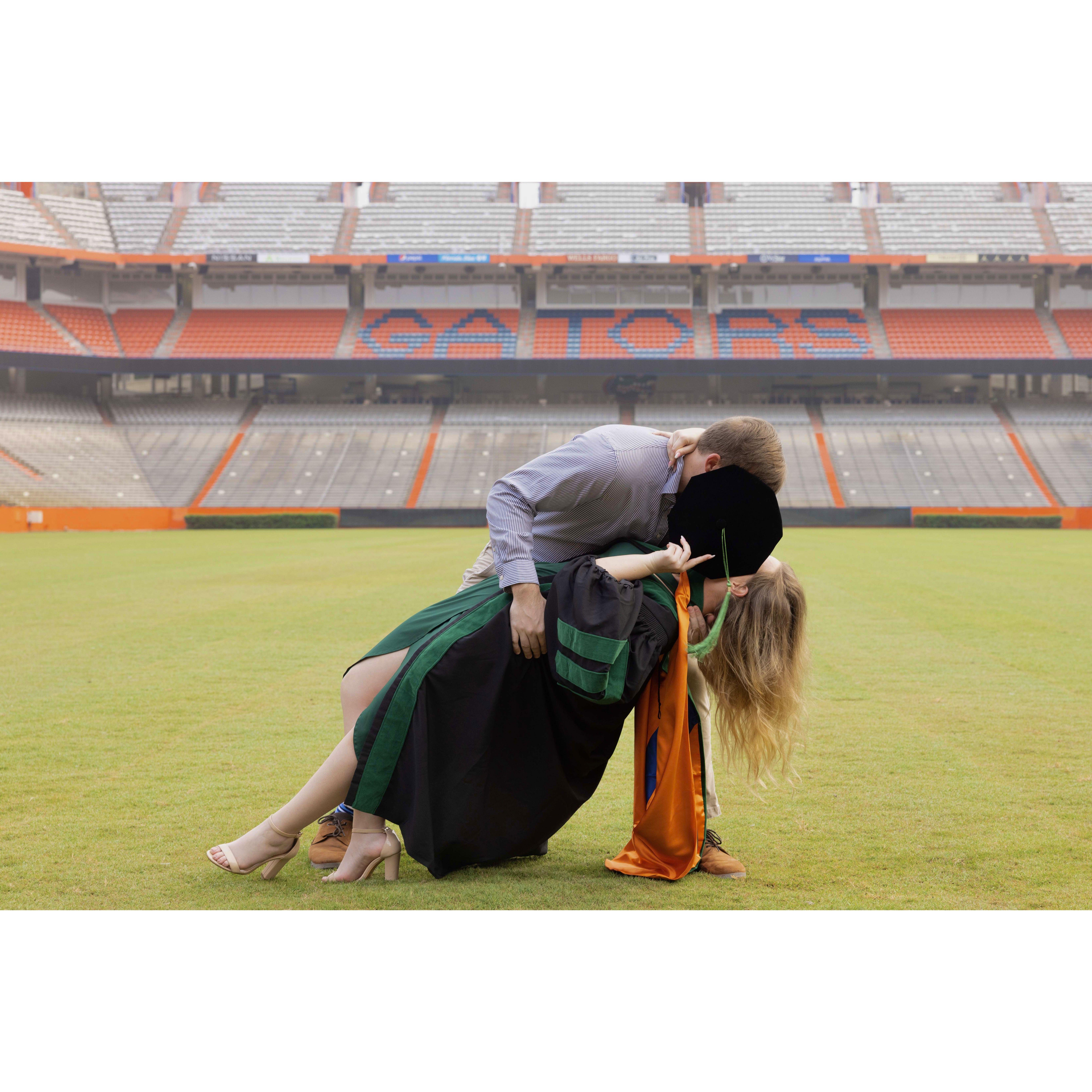 Celebrating Erin's medical school graduation with a sweet congratulatory kiss