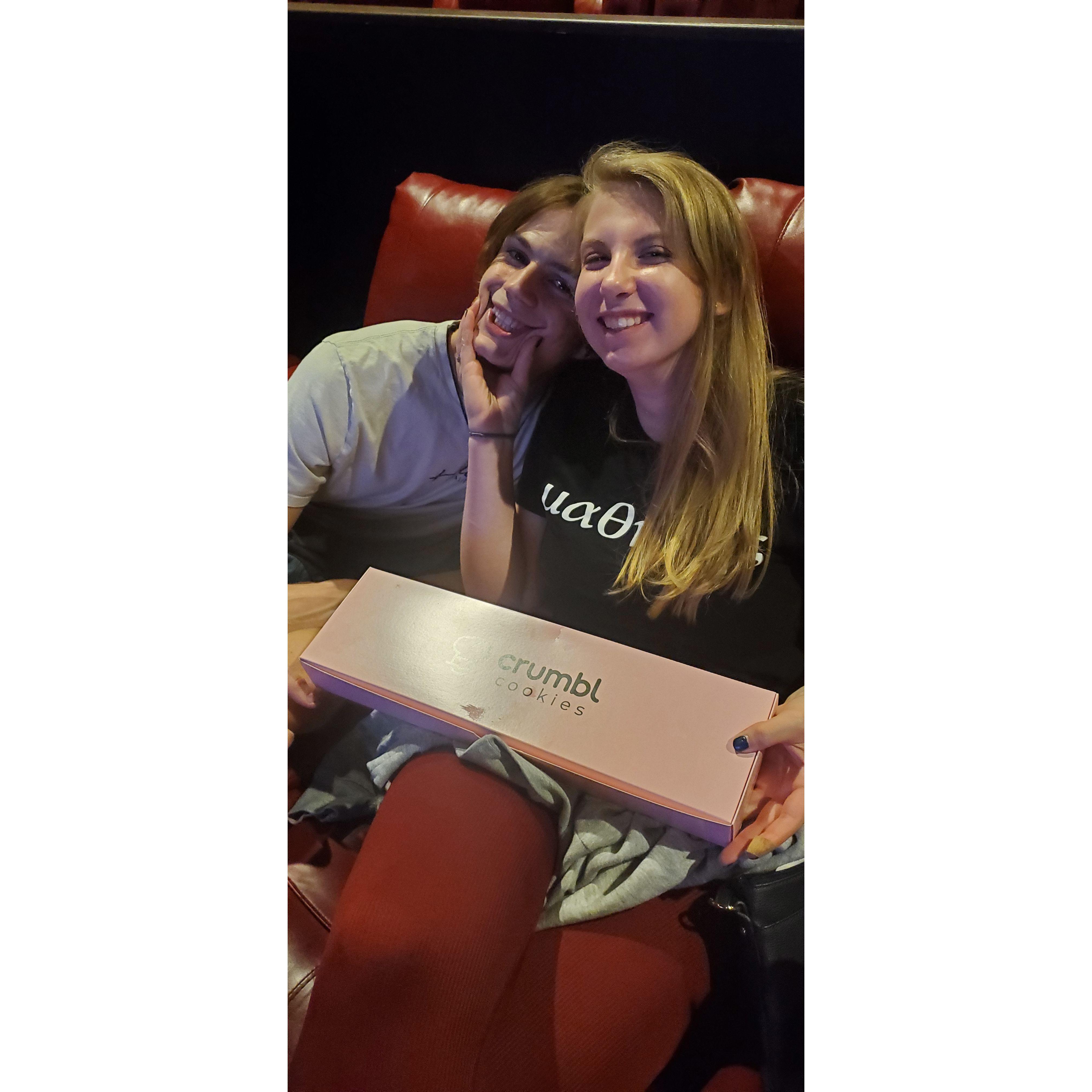 Who doesn't enjoy a full box of crumbl cookies while at the movie theater?