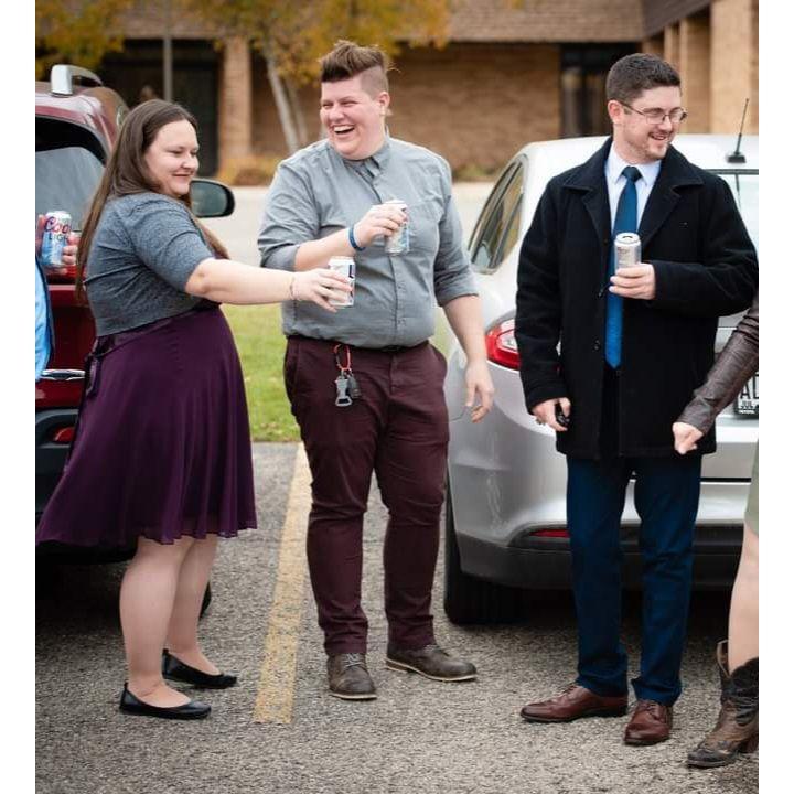 Hunter wedding beers in the parking lot