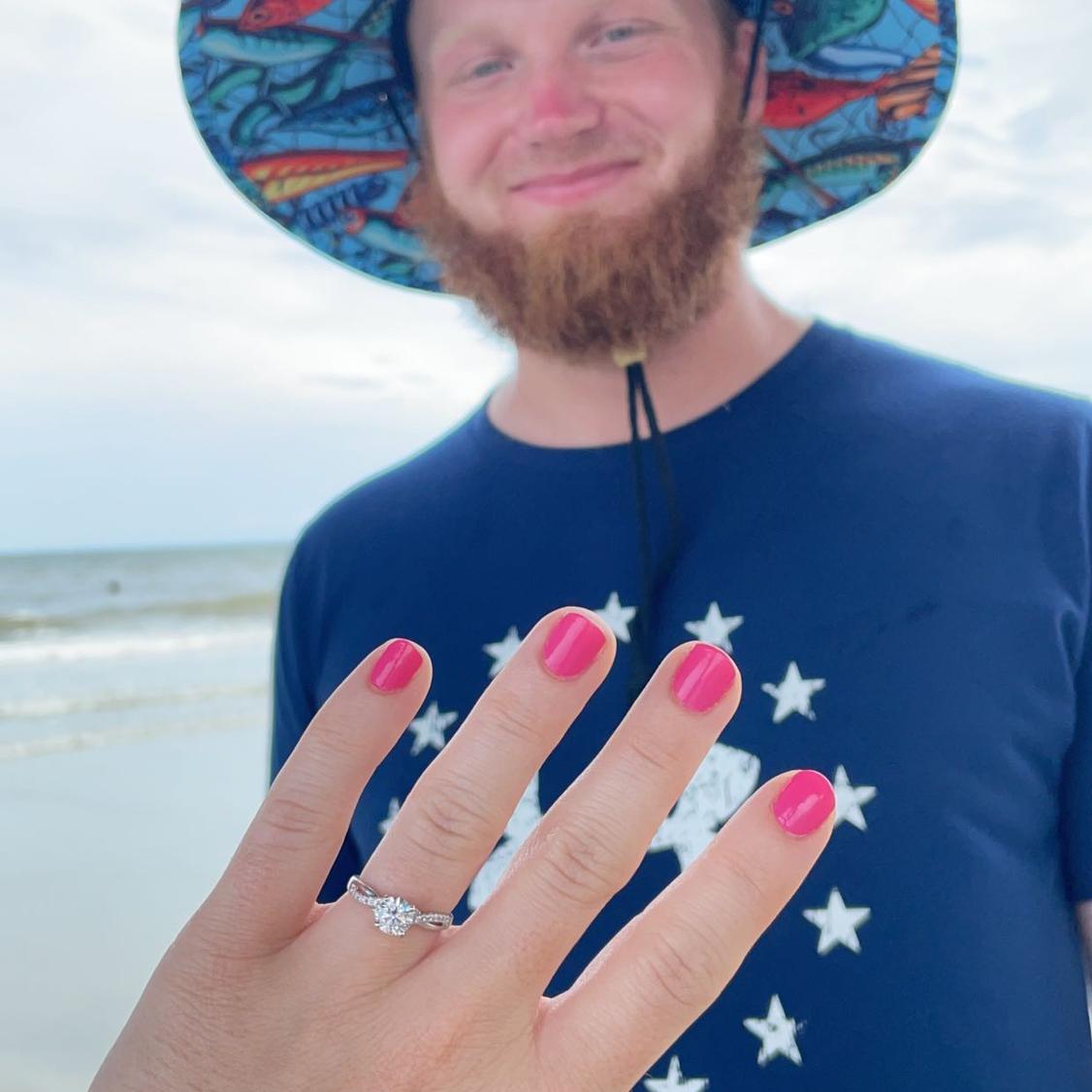 Engaged on Tybee Island in Georgia 7/10/23. Also Nolan’s first time at the ocean!