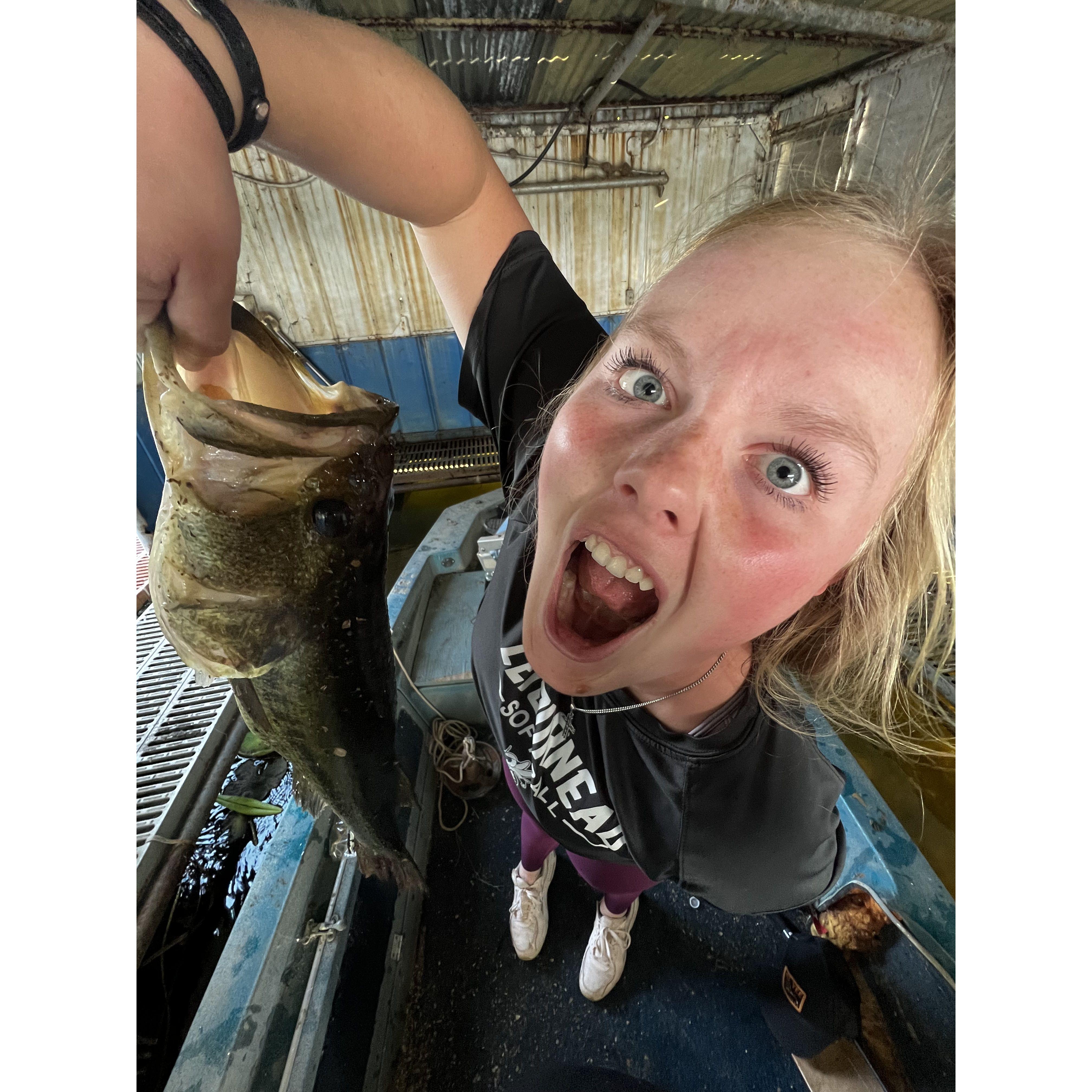 Our first fishing trip together! Carter caught this fish, but Lexi wanted a picture with it. This is one of Carter's favorite photos!
