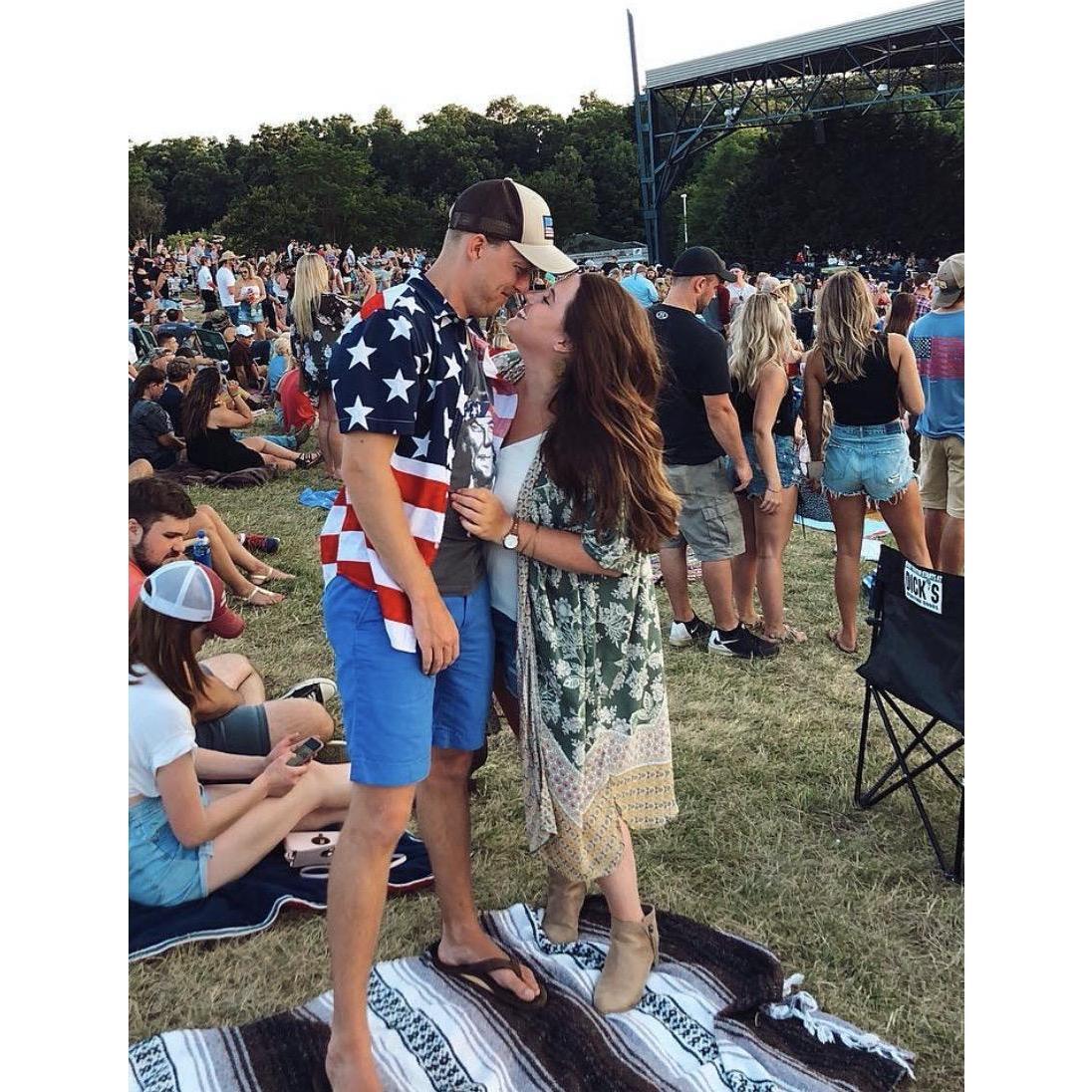 One of the many country concerts we've been to. Adam's Miller Lites + Megan's margaritas + live music + patriotic peeps = one happy couple