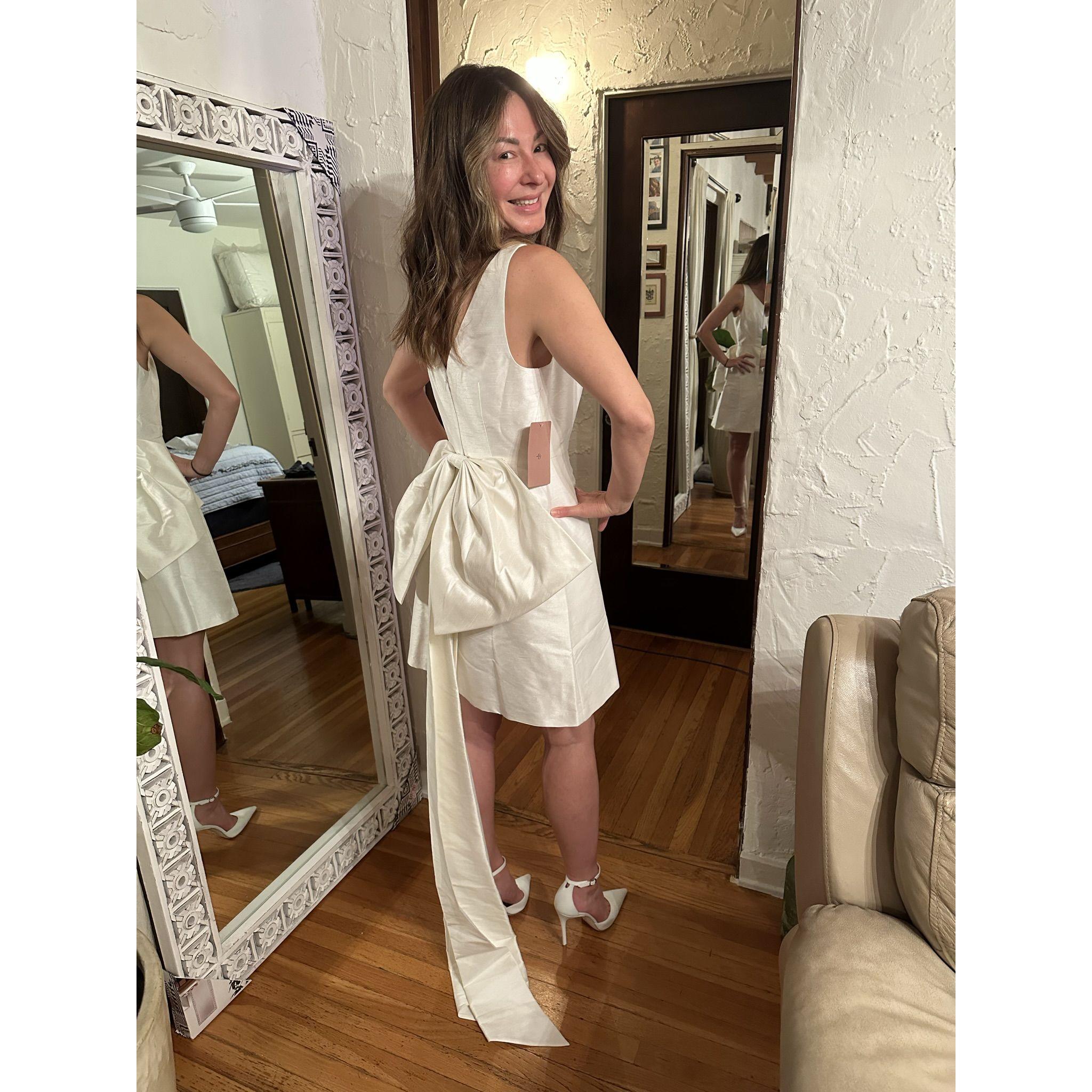 Trying on a million dresses before landing on the perfect one...