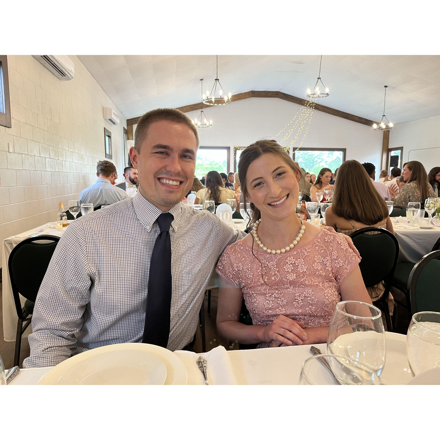 Enjoying dinner at Brennan and Teresa's wedding reception. Paul measured over 50 cups of powdered sugar to help Olivia make the cake!