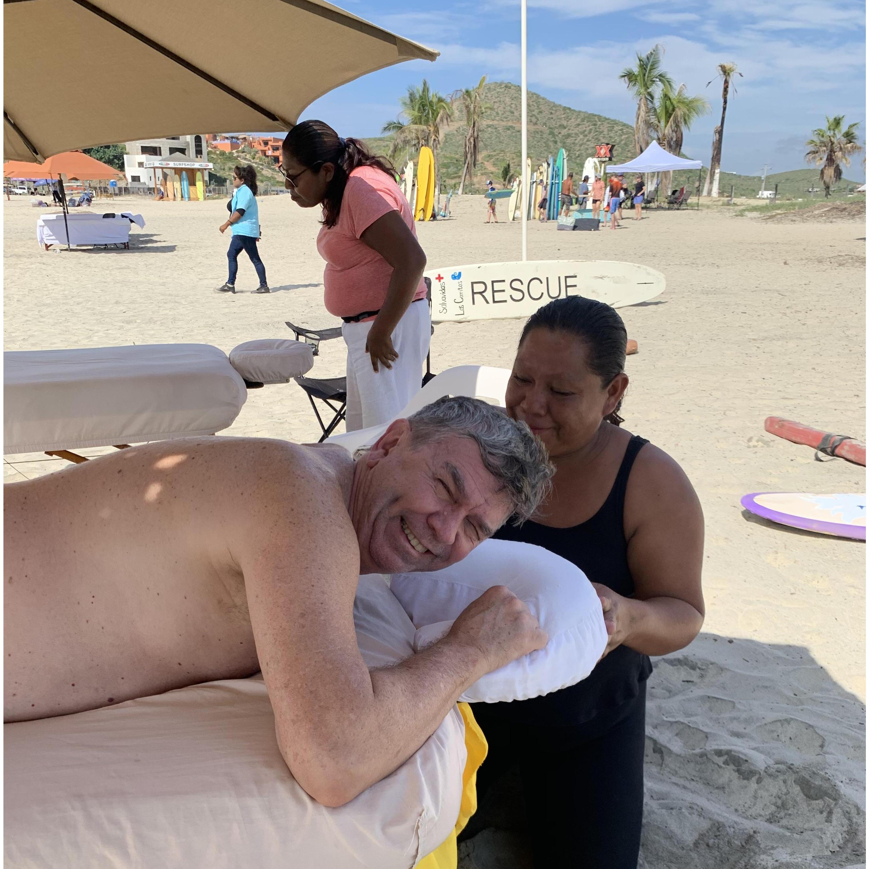 Kelsey's dad gets a rub down at Playa Cerritos