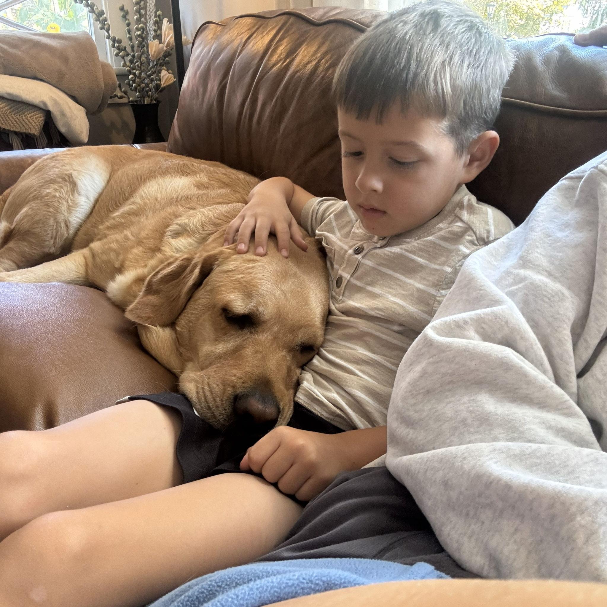 Parker getting to know, and love, his new boy, Bakon.