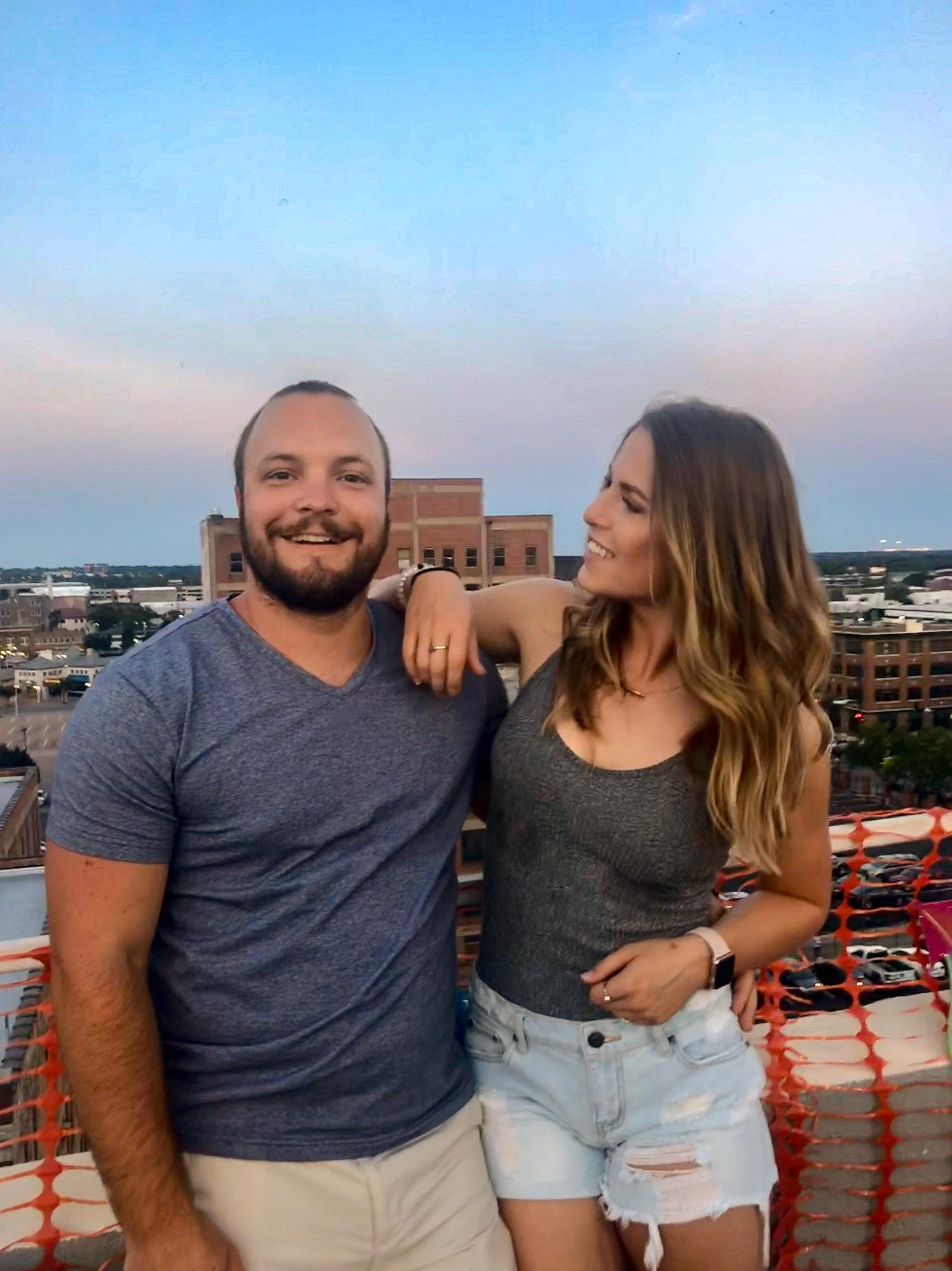 The top of downtown WIchita parking garages have the best light! DJ and Katie snapped this photo after visiting booths at an event downtown.