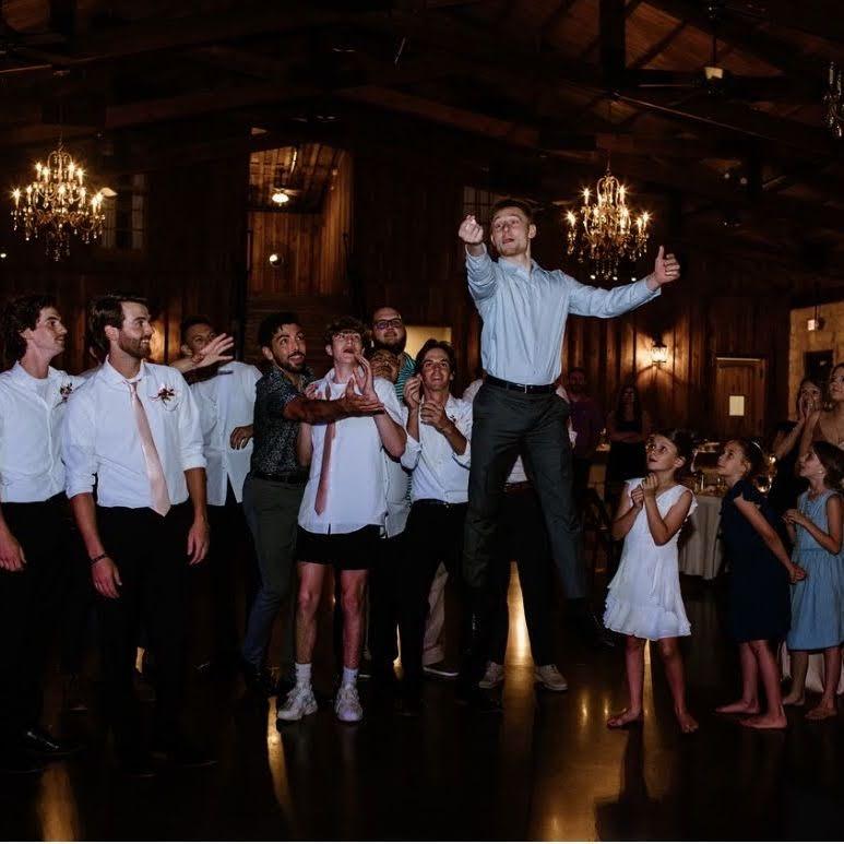 Caden catching the garter at our second wedding together June 2022