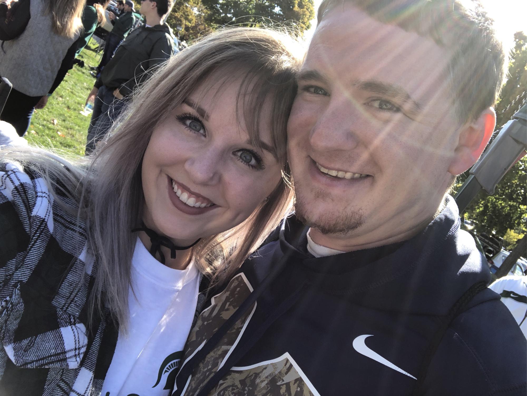 Who wears UM gear to a MSU/CMU game?