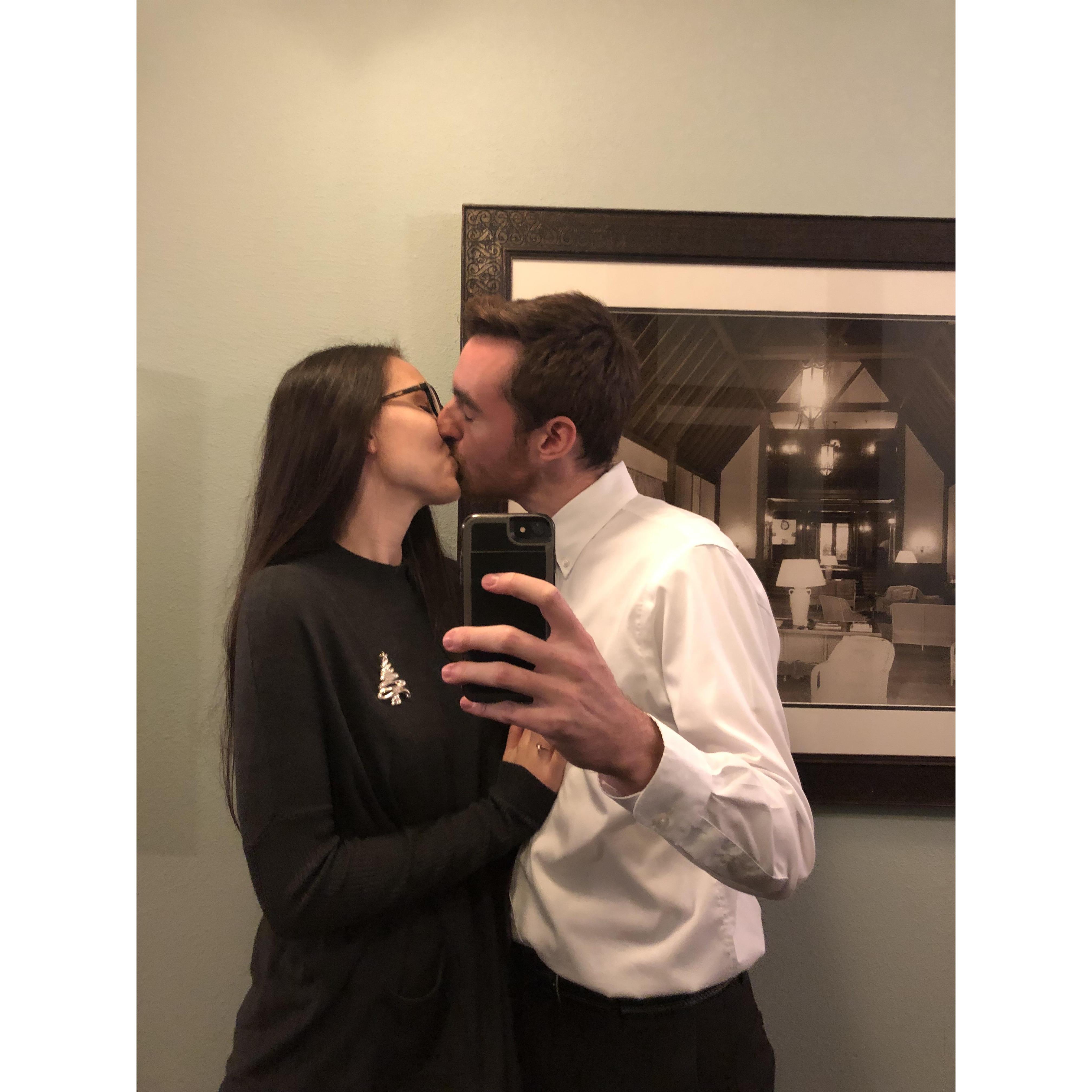 Sneaking away to get a kiss at his work Christmas Party!