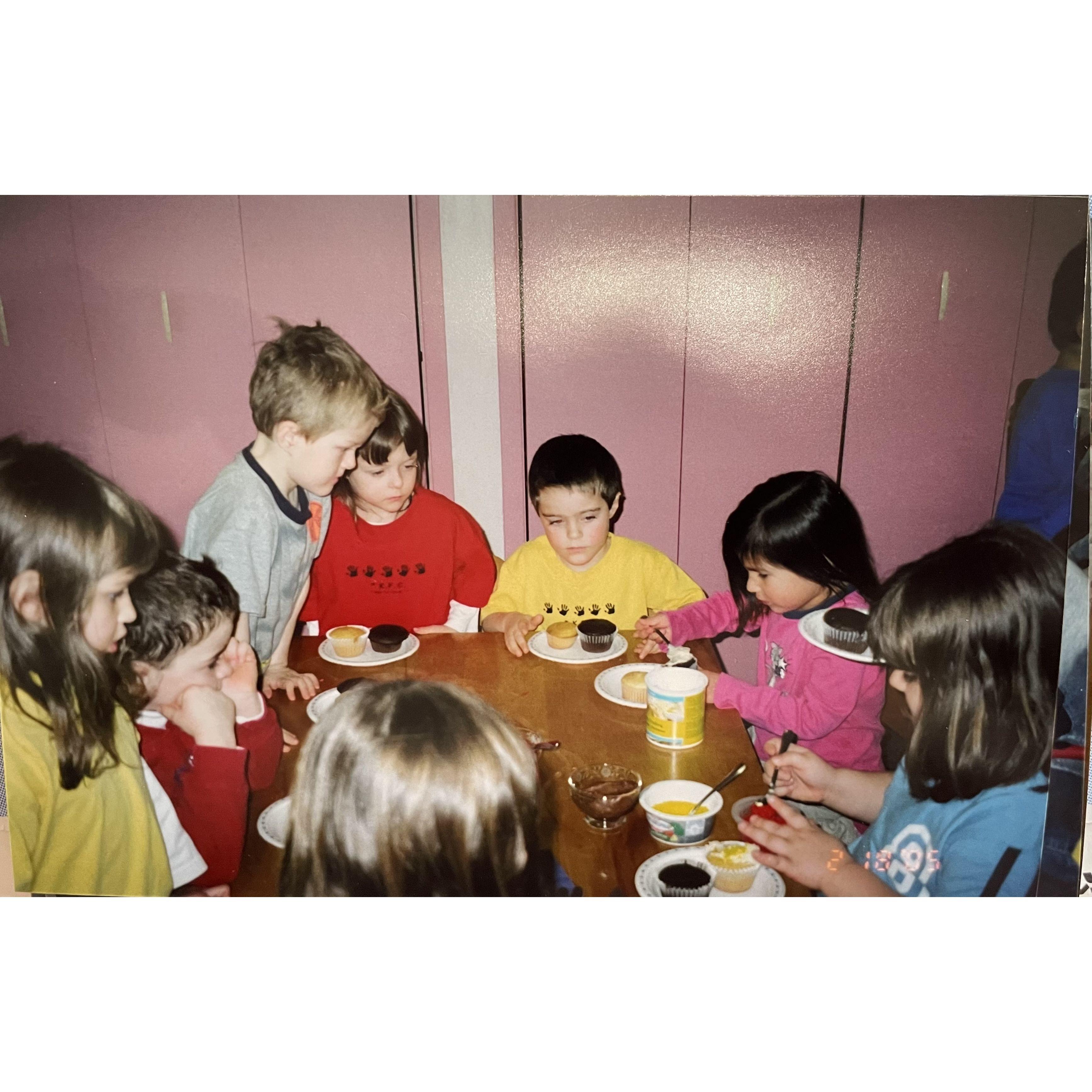 A throwback picture of us decorating cupcakes at K.F.C. in 2005