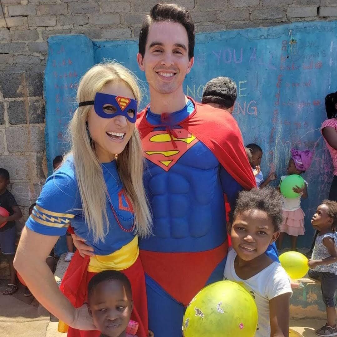 My "Superman" (Patrick) and I in Diepsloot, South Africa! We served the kiddos at a local crรฉche (preschool). This was Superhero day!