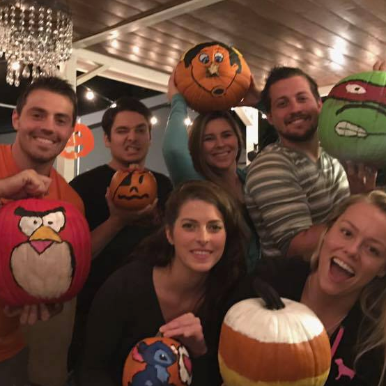 Decorating pumpkins with friends and family!