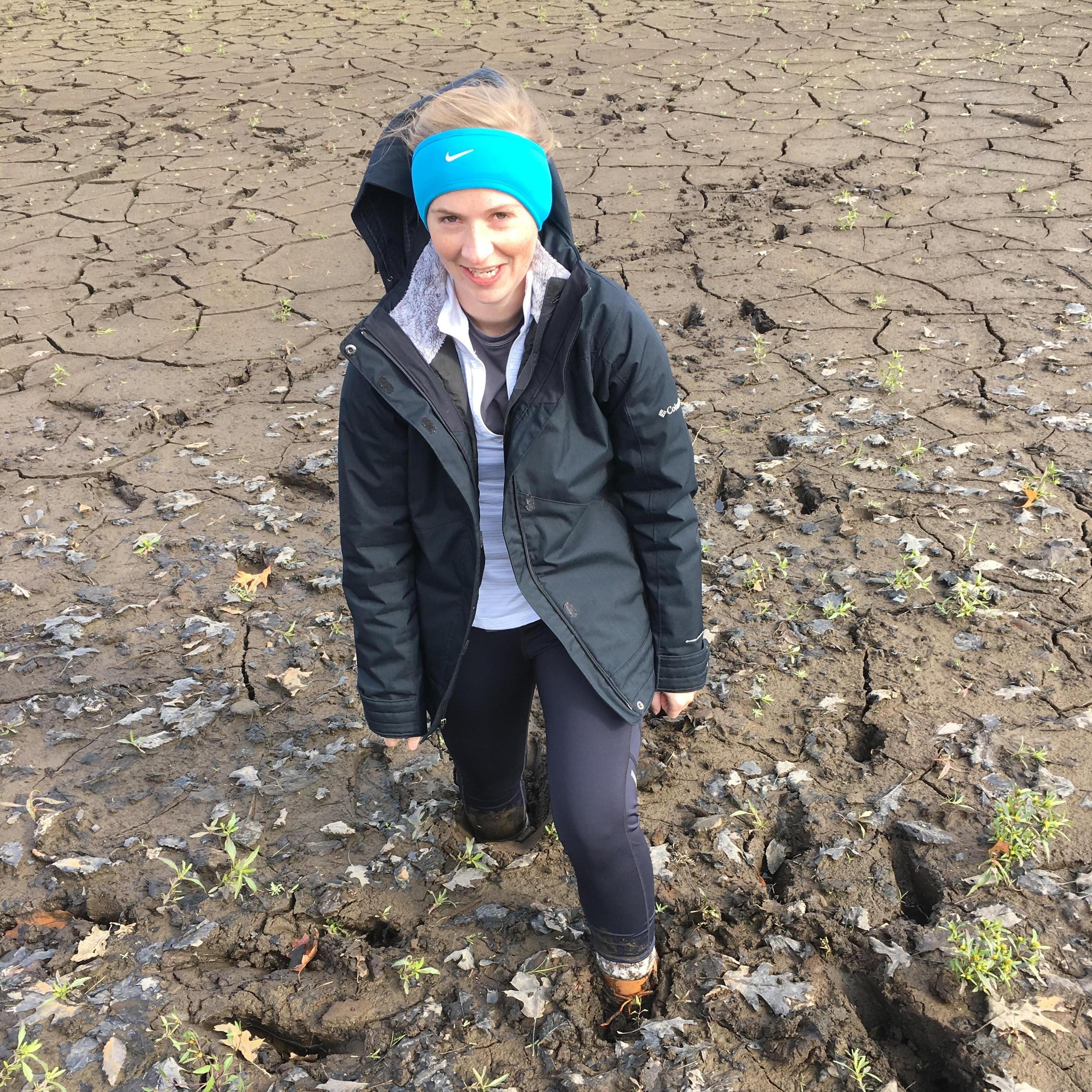 Lauren stuck in knee deep mud while exploring...