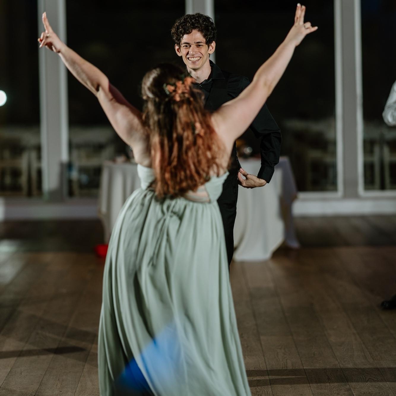 dancing at friend’s wedding, august 2022