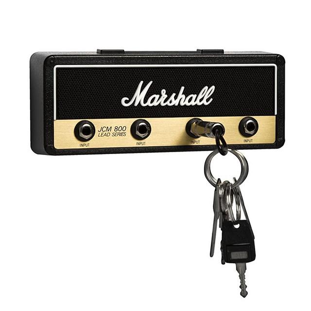 Licensed Marshall Jack Rack- Wall mounting guitar amp key hanger. Includes 4 guitar plug keychains and 1 wall mounting kit. Easy installation.