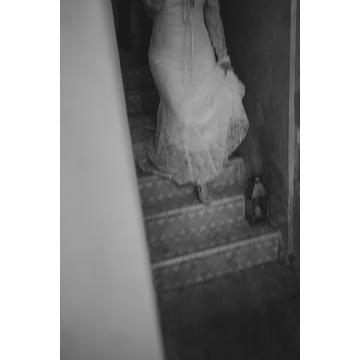 Tilly descending the stairs