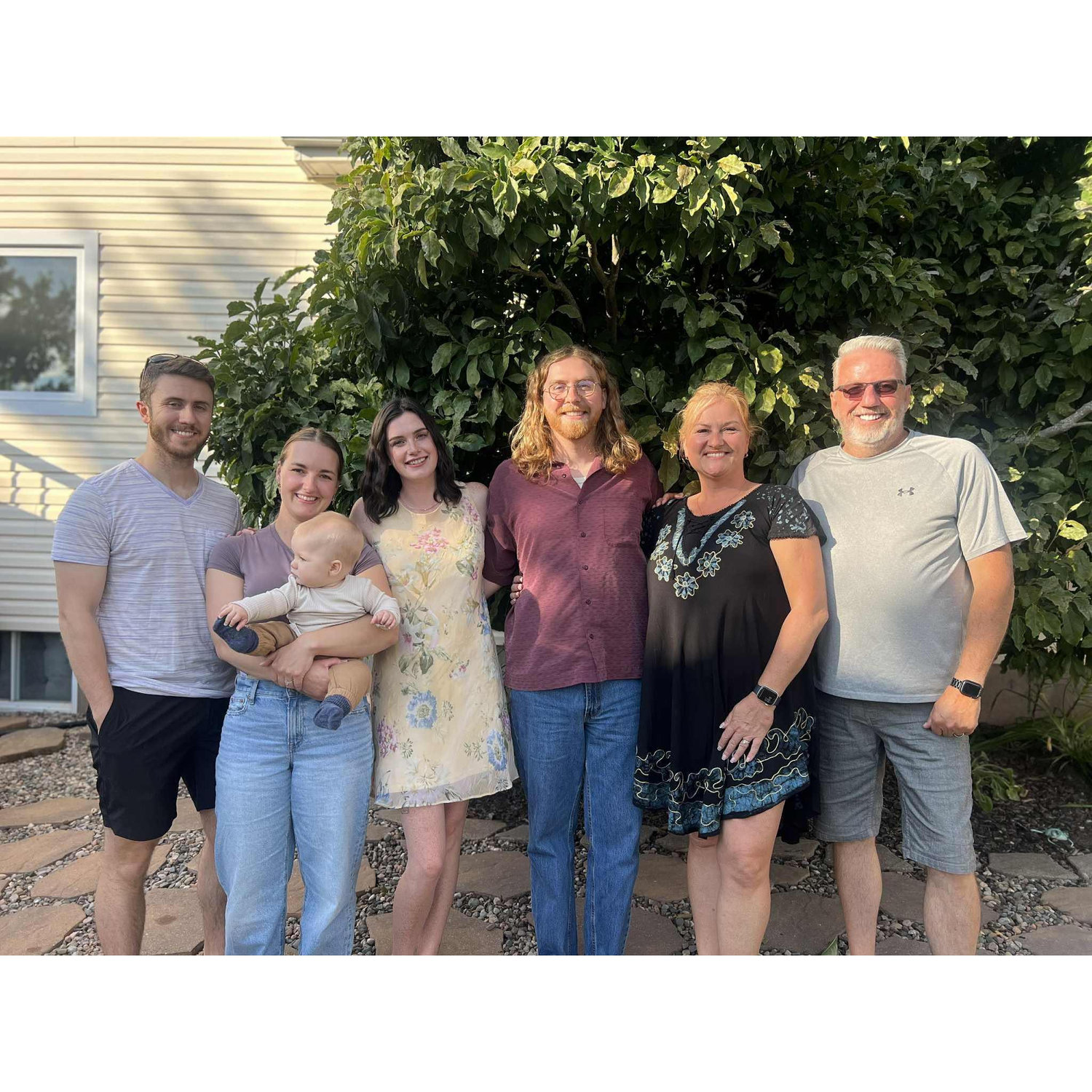 Together with Andrew's family at our engagement party-- Lucas, Jerrica, Rhyland, Lily, Andrew, Elaine, and Ross -- 23rd August 2025