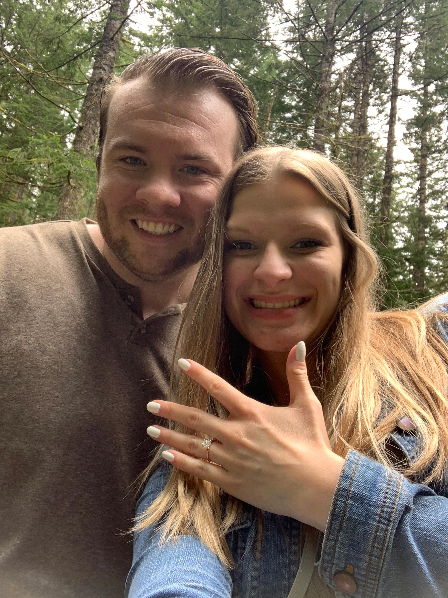 The proposal! 
Brock took me to a beautiful trail near Larch Mountain and proposed to me by the most quaint, little creek! It was a little rainy that day, which made for the perfect PNW proposal!