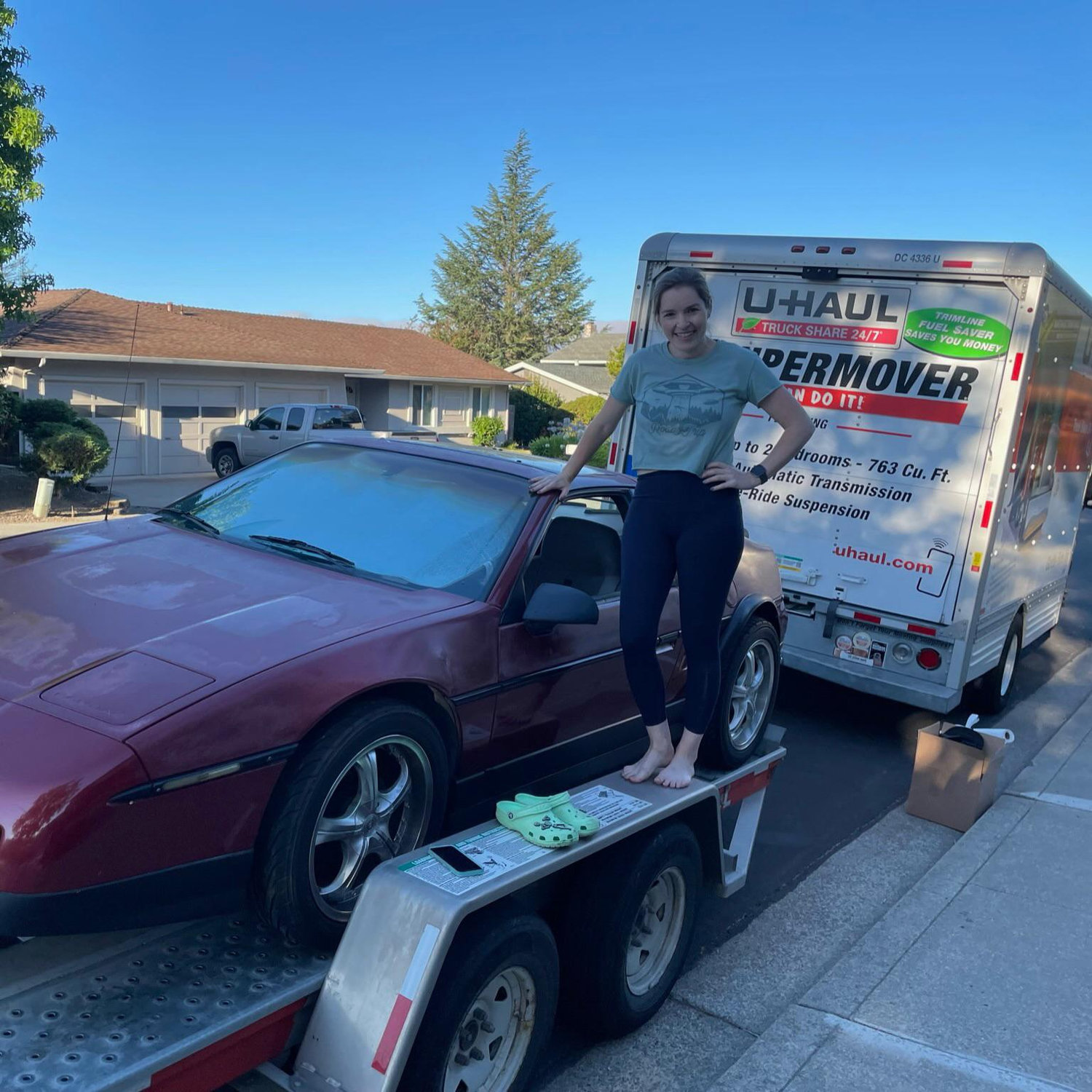 Jen is pretty proud of herself for backing the Fiero onto the U-Haul trailer.