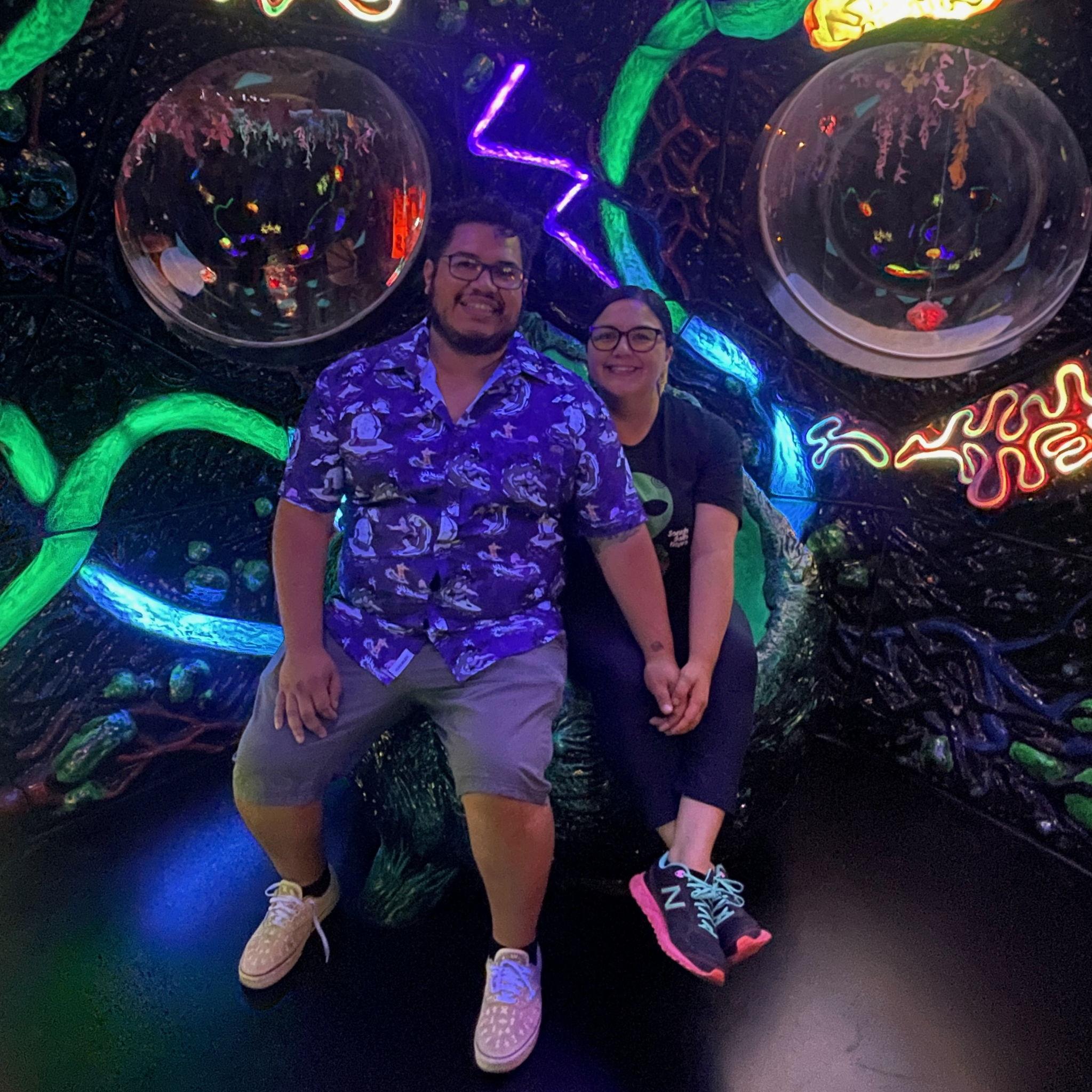 Our love is outta this world! Lol and no, Moises is not sitting on Mandy! Meow Wolf, July 2024