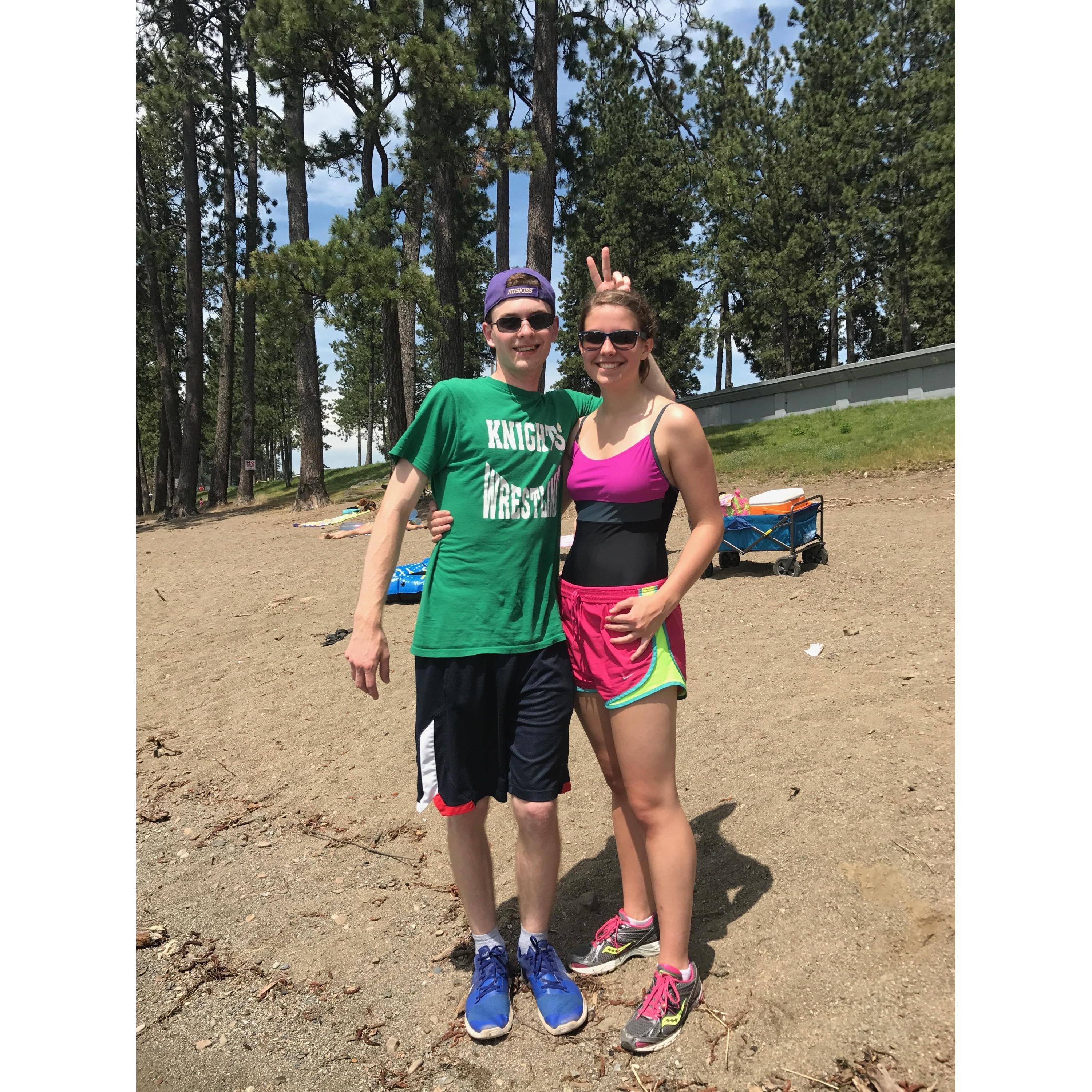 Swimming & playing basketball at Lake Coeur D'Alene. We found a piece of driftwood that I carved our initials into.