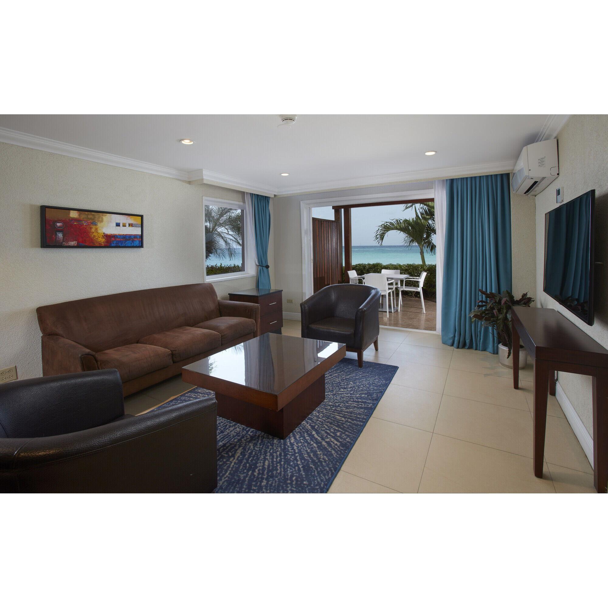 DIVI 2 Bedroom Ocean Front Suites: Panoramic views of the Caribbean Sea. Master bedroom features a king bed and en-suite Jacuzzi, 2nd bedroom with double/double bedding and separate bathroom.