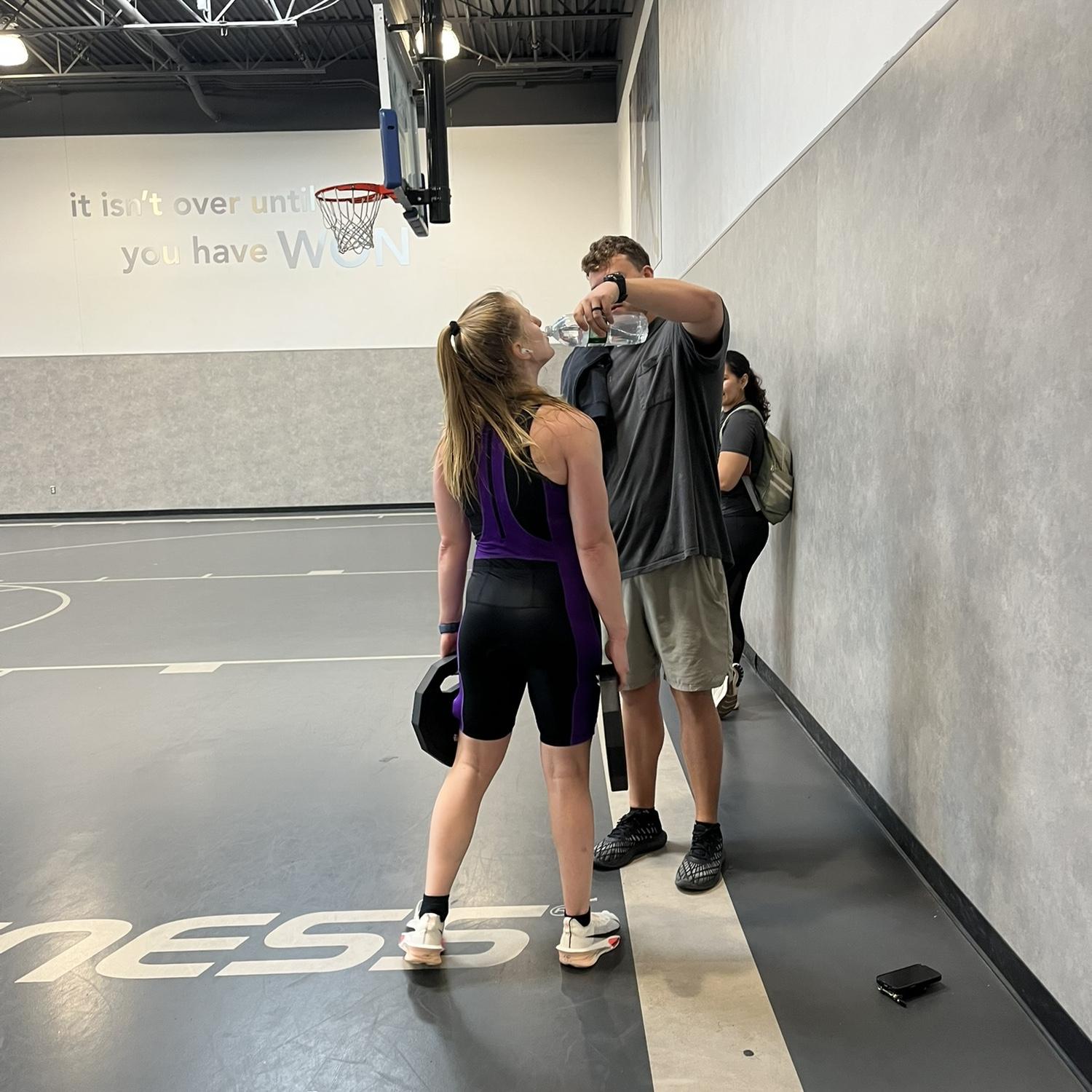 Garrett supporting Nichole at her most recent fitness competition!