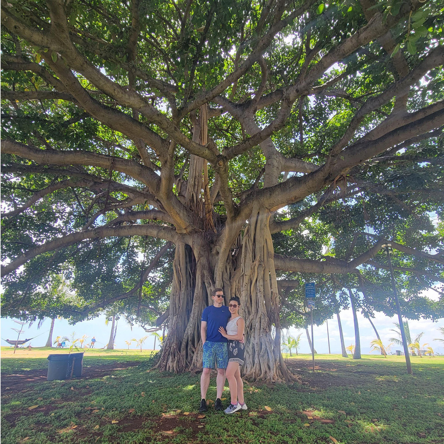Our first trip together to Hawai'i. We are under a banyan tree at Ala Moana!