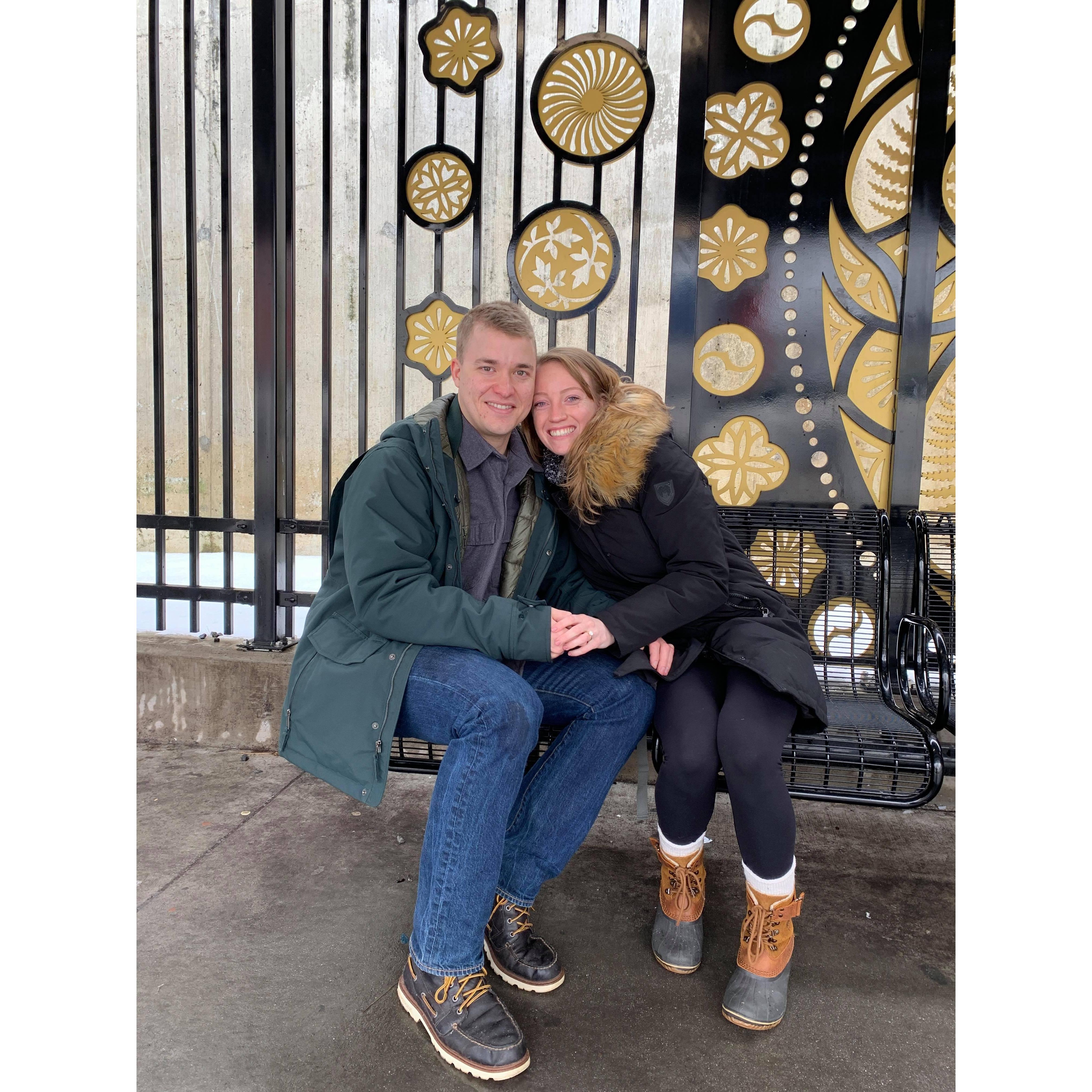 Our first picture a stranger took of us after Jimmy popped the question.  No Ashley had no idea this was going to happen. Also no she hadn't showered yet for the day :)