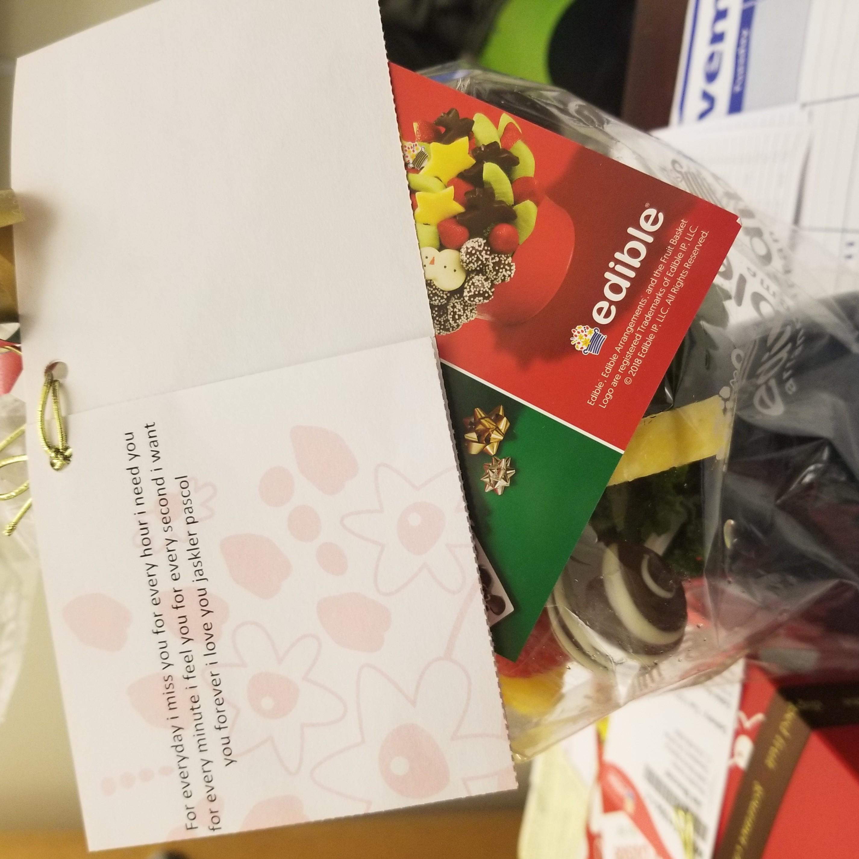 Bae surprised me at work by having an Edible Arrangement fruit basket delivered to my job.