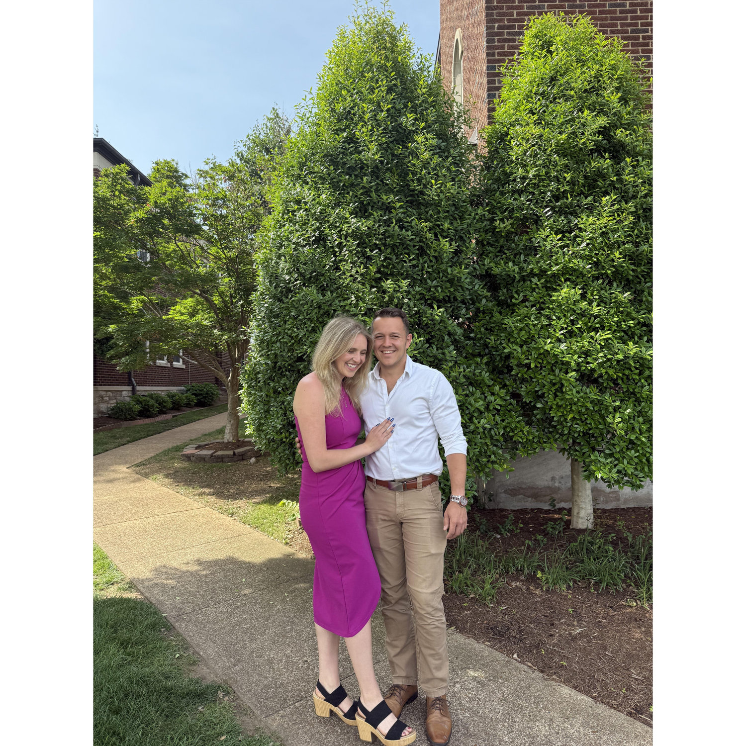 Smiling outside of St. Ann's where we will be getting married!