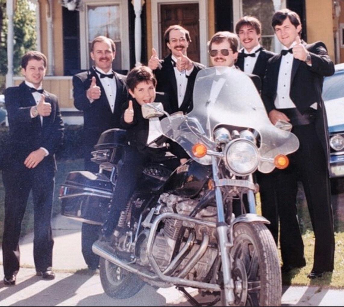Dave being so happy at their parents wedding party.