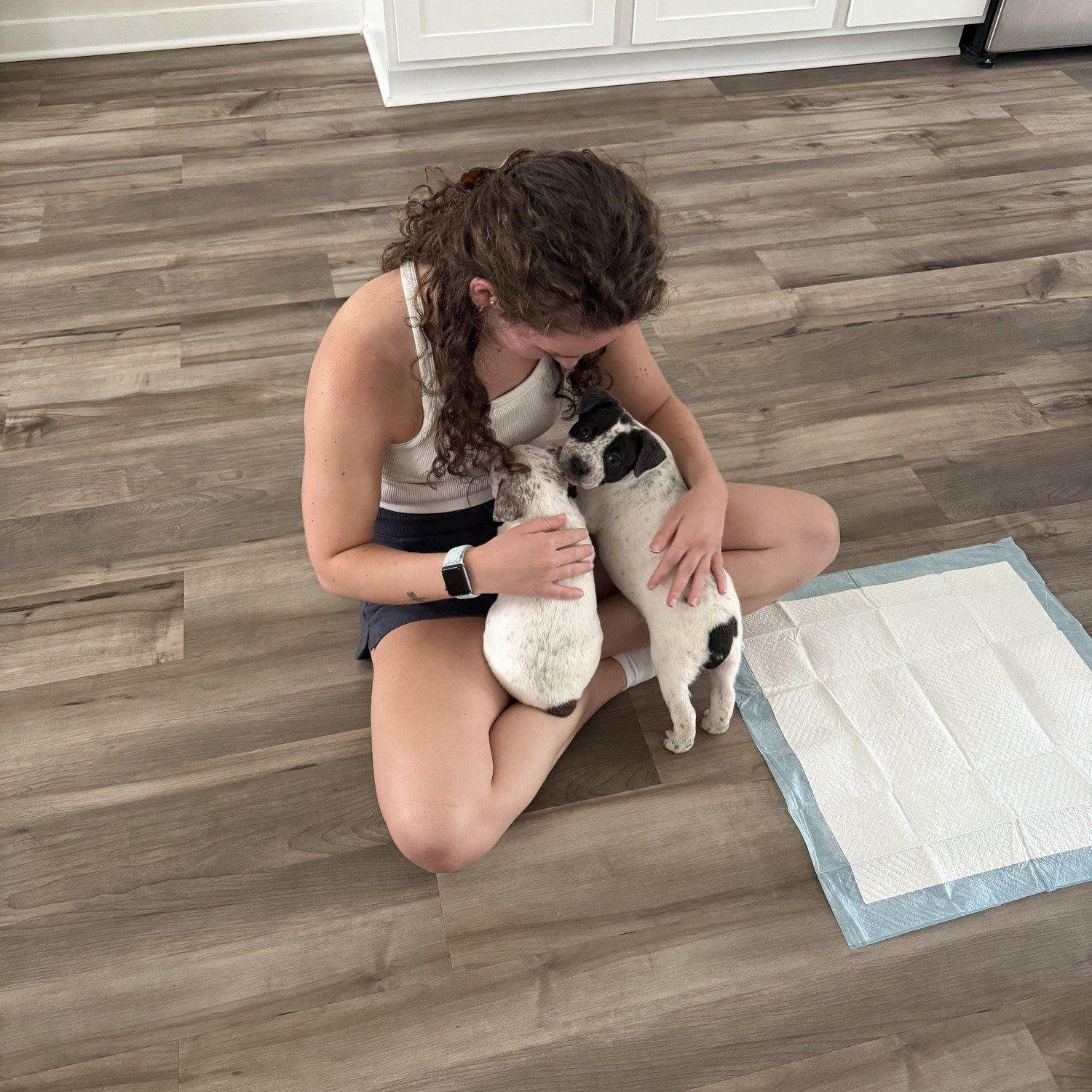 Suprised Lontae with two foster puppies! Pork & Beans!