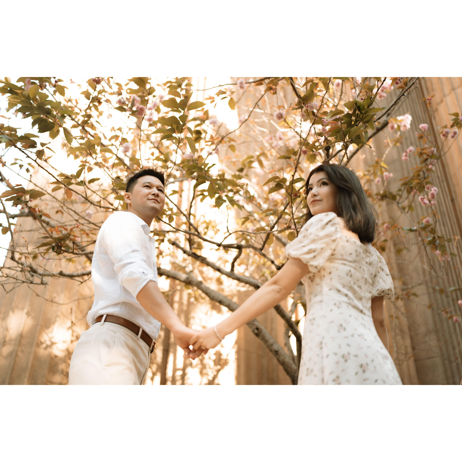 Hand in hand, we wandered on the charming grounds of the Palace of Fine Arts, capturing precious moments during our engagement session.