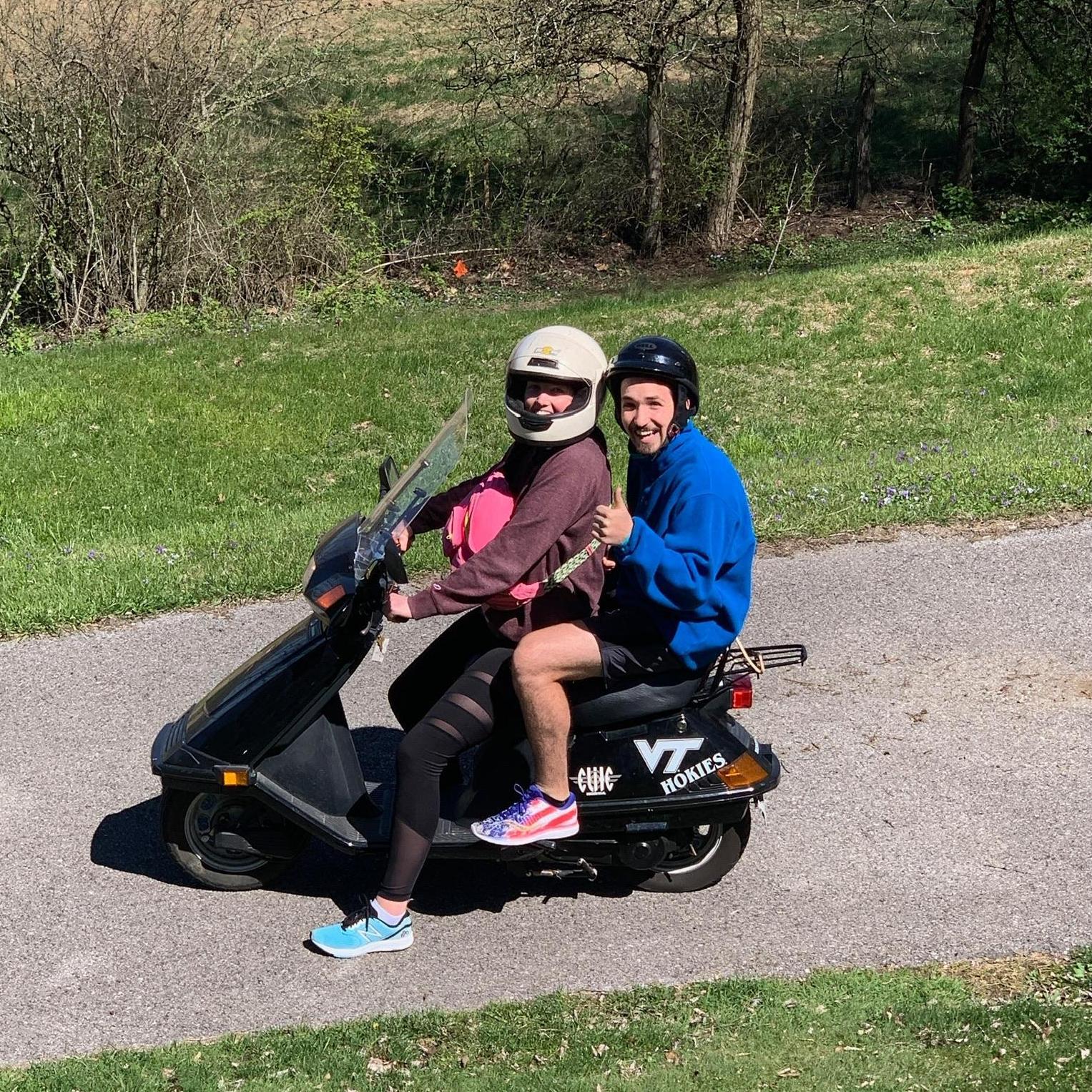 This was us riding my dad's moped around Blacksburg. Yet another form of couple's therapy LOL
