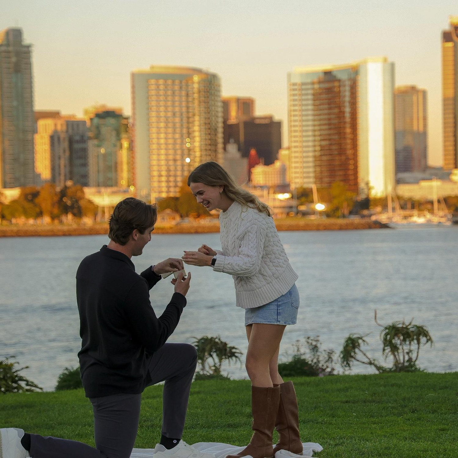 The proposal! It was a total surprise, I thought my roommates and I were going to look at Christmas lights at the Hotel Del Coronado but they detoured and he met us at Centennial Park in Coronado.