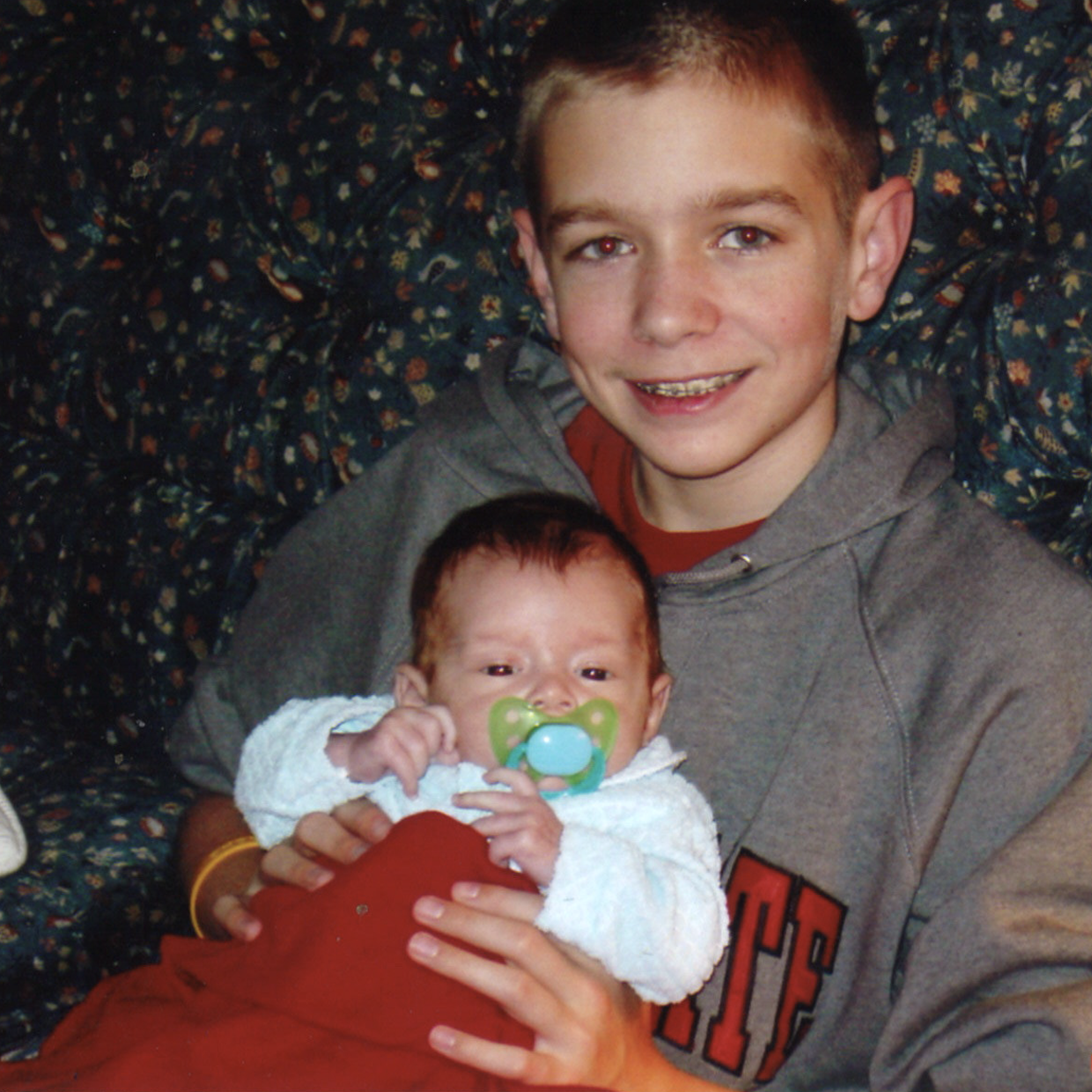 2005 - Alex holding his newborn brother Nicholas