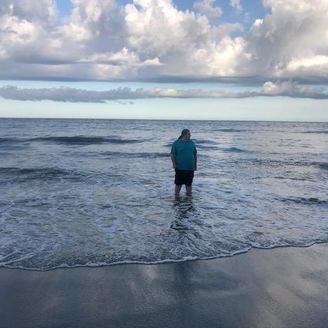 Let's go to the sea, before sunrise. The city lights go out one by one, the stars fade...then the horizon glows, almost like it's on fire.