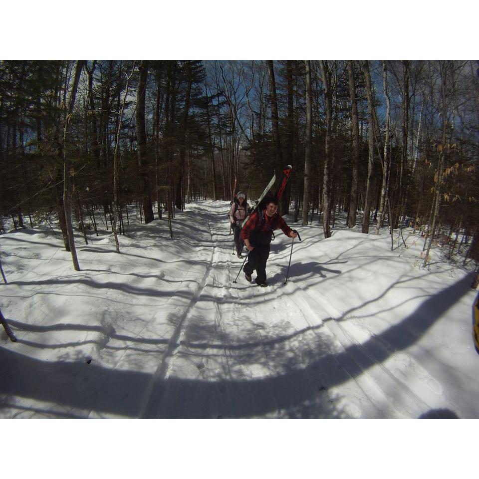Hiking up Doublehead mountain to ski down