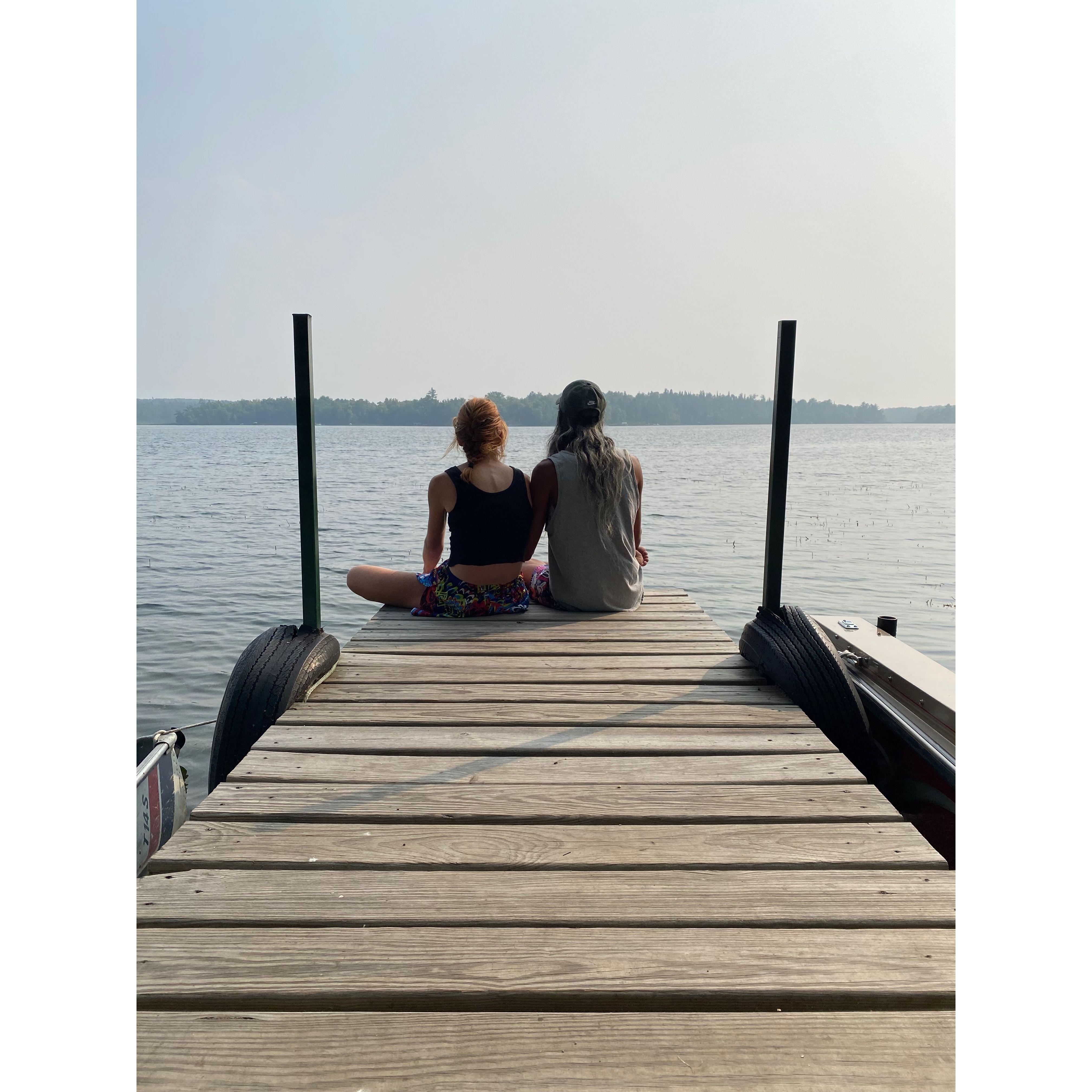 Sitting on the doc at Little Norway (cabin in MN)