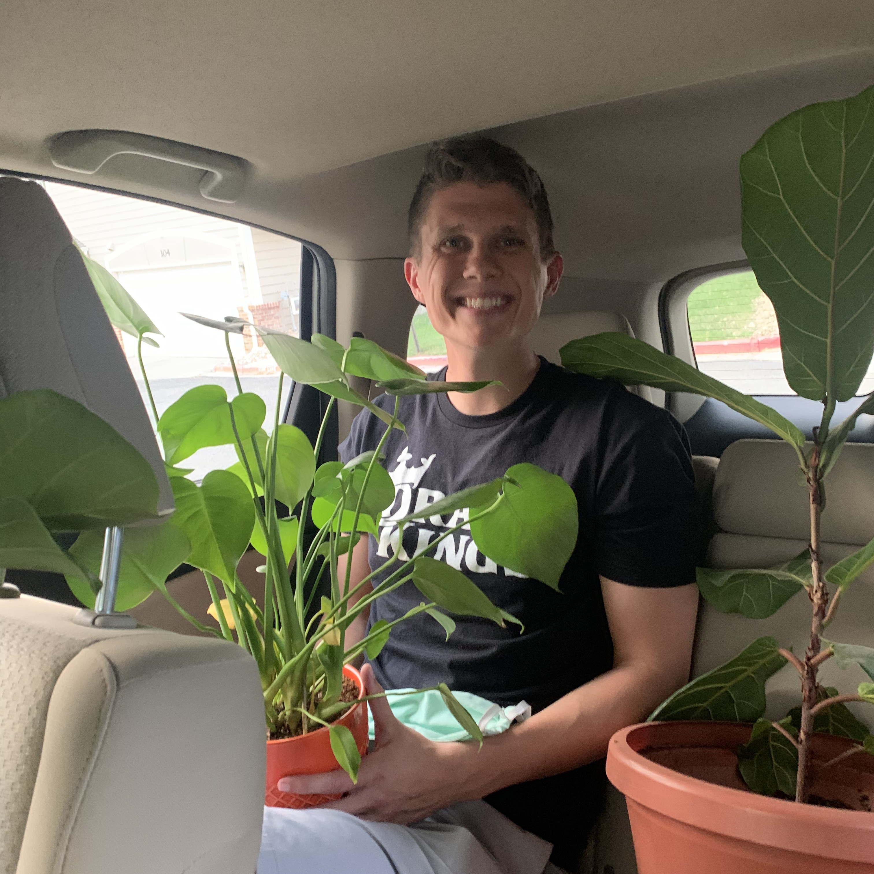 Drake taking great care of Allie's plant babies