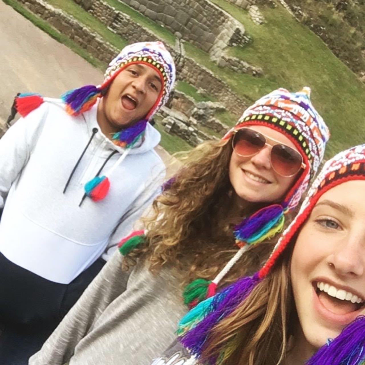 Borrowed some funny hats during a stop along the Sacred Valley in the Andes Mountains of Peru
