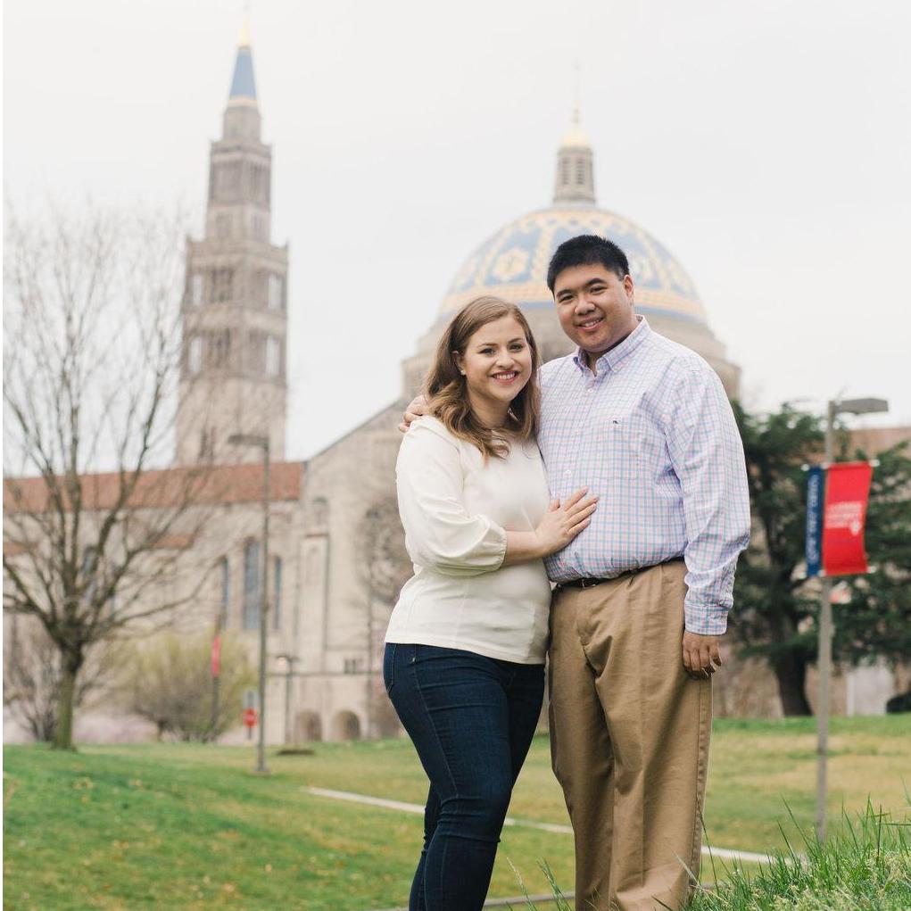 Cherry blossom engagement pictures at the Basilica of the National Shrine of the Immaculate Conception, March 2020. (Kate Grace Photography)