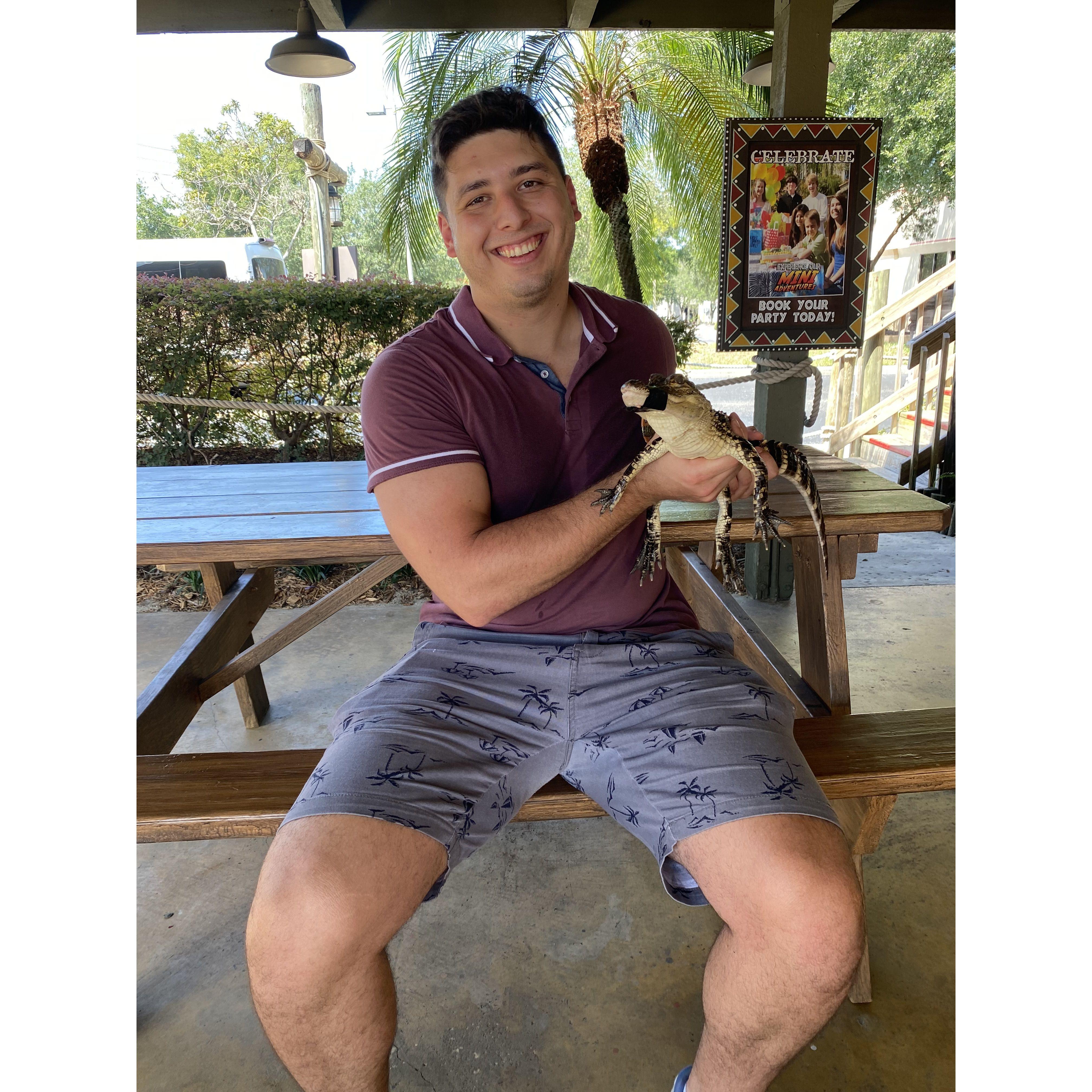 Second ate at Congo River mini golf. Alex wanted us to hold baby alligators after our match.
