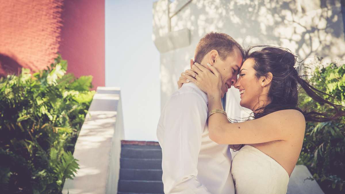 First Kiss Wedding Photos  Eivan's Photography & Video