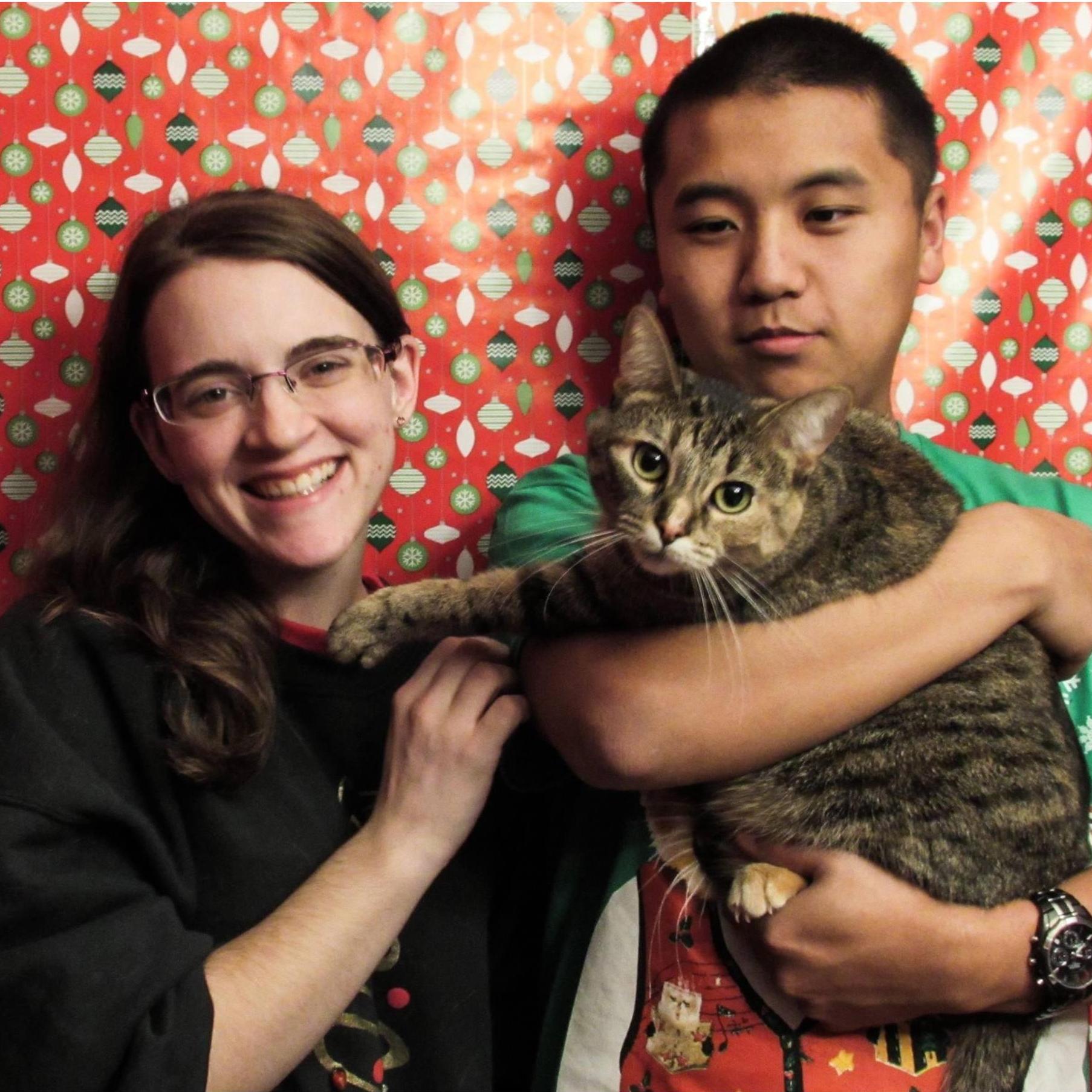 Another year, different sweaters, and our cute chunky cat