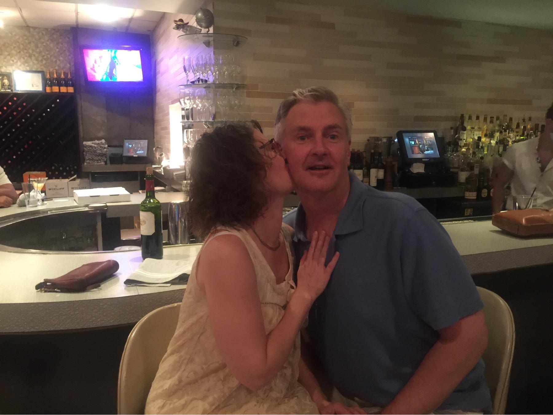 “Found-You Day”. We are celebrating two years together. We are sitting in the same seats as where we met. I am actually wearing the same dress I wore when we met.