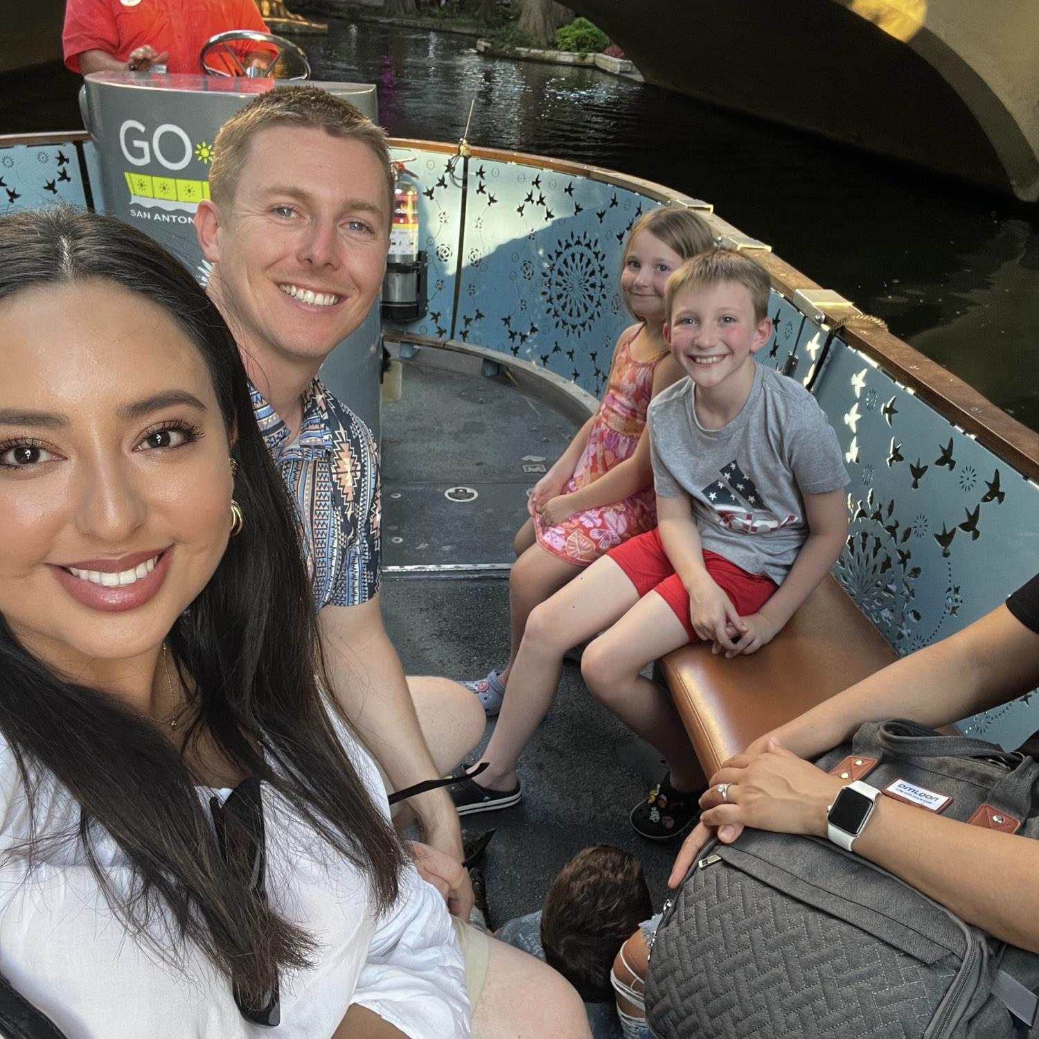 Daniel and Jocelyn with Abby and Gunner on the Riverwalk.