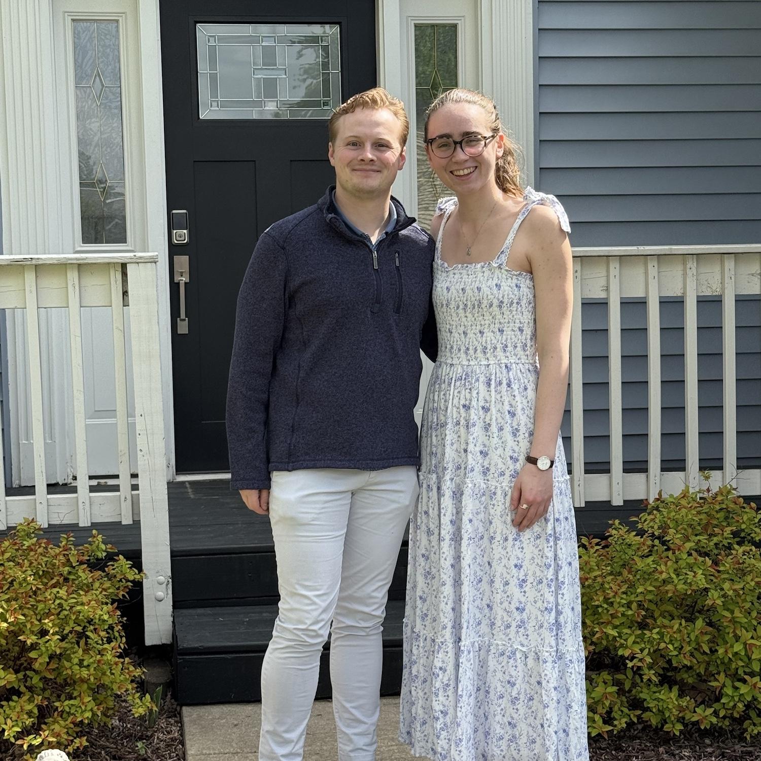 Kristen and Sean outside their new house on closing day!